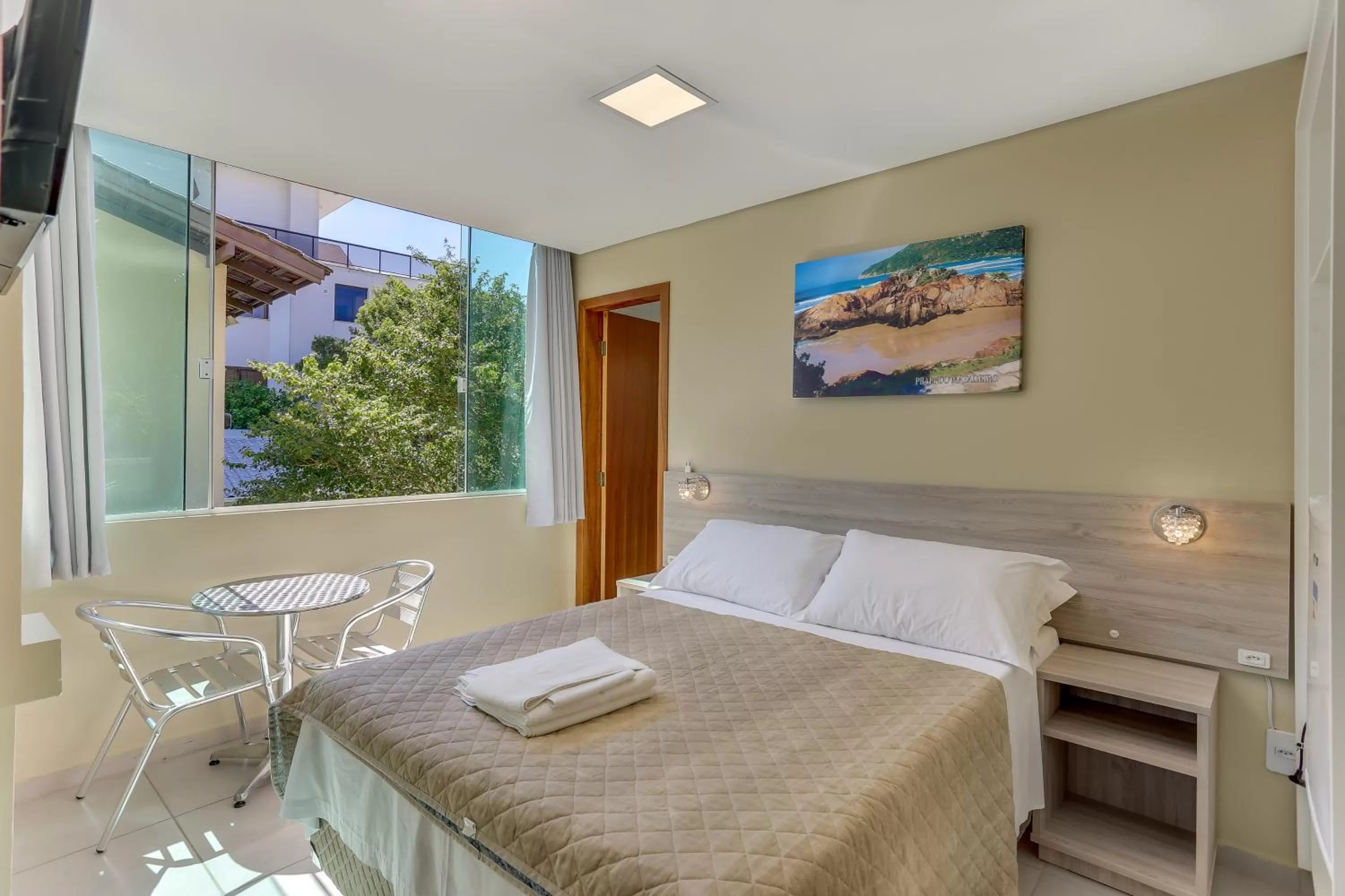 Bed in Pousada Tissiano