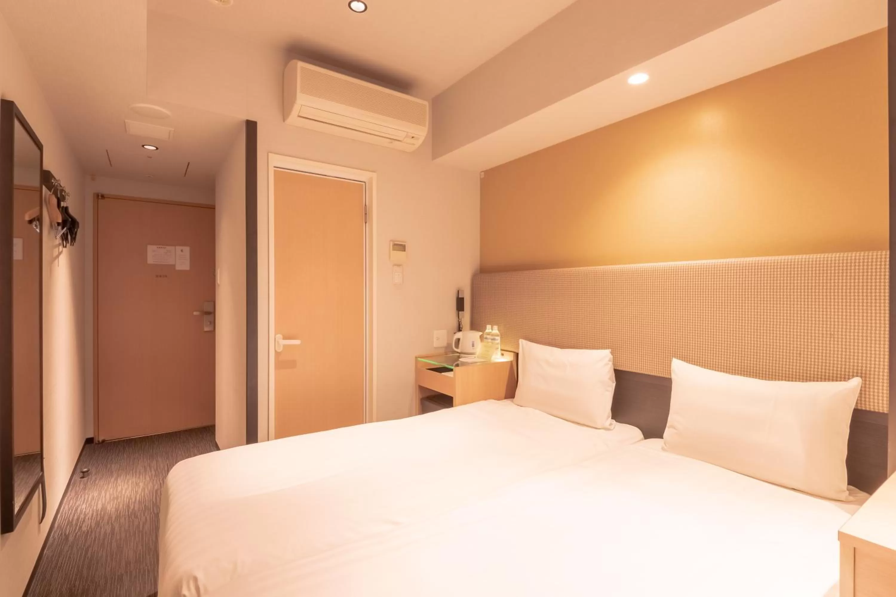 Bed in E Hotel Higashi Shinjuku