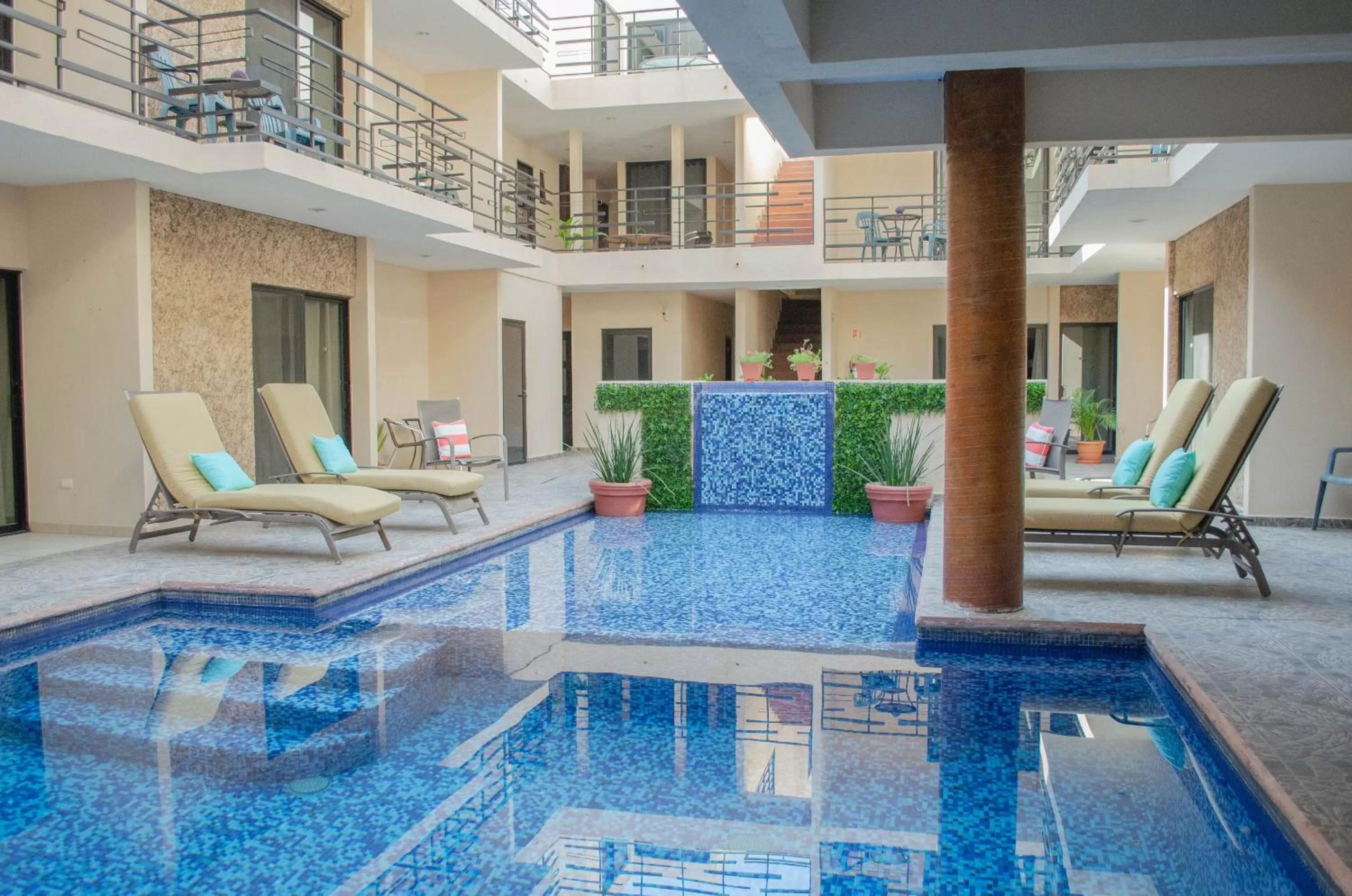 Swimming pool in Pedregal Suites - Marina and Downtown