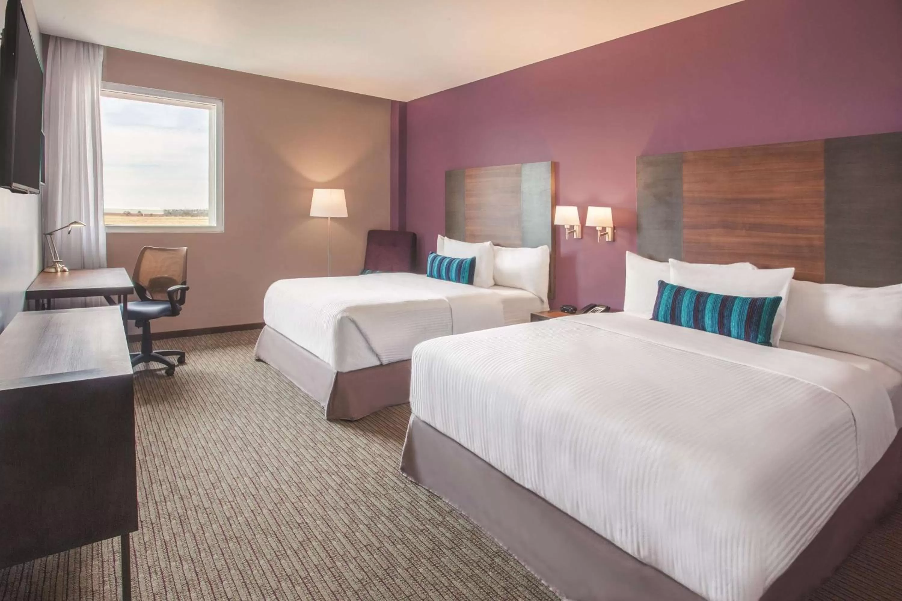 Photo of the whole room, Bed in La Quinta by Wyndham Aguascalientes