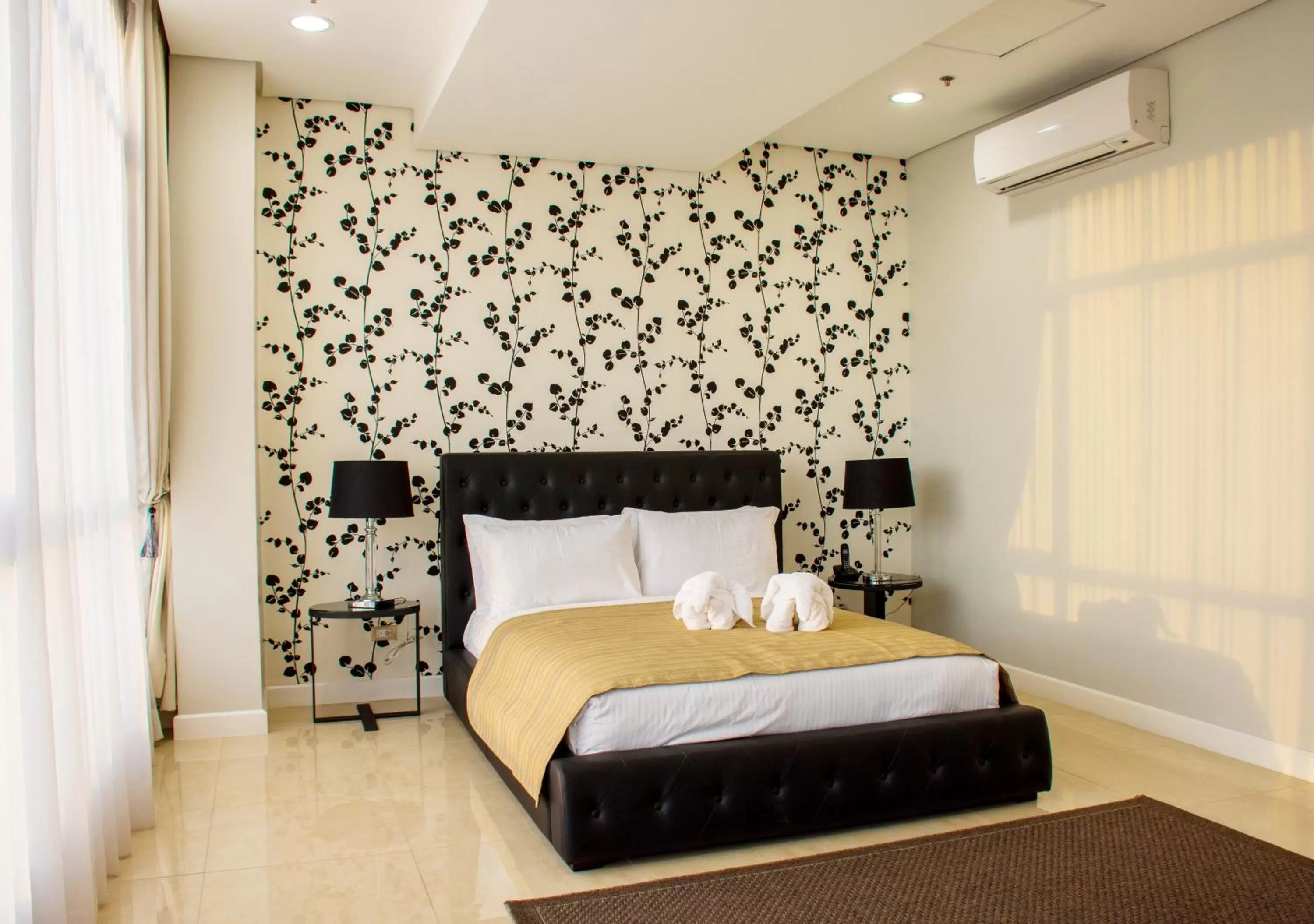 Bed in Alicia Apartelle