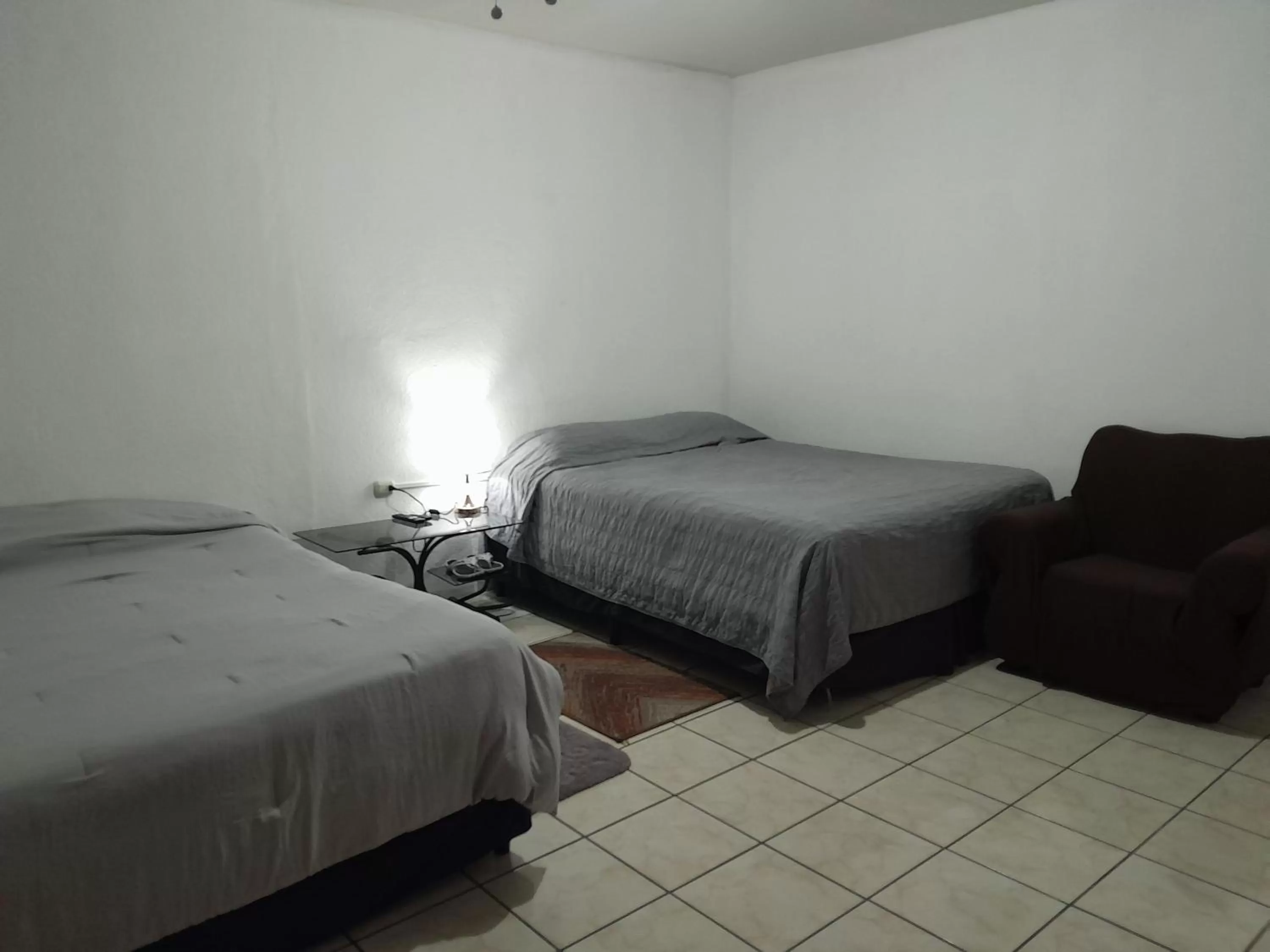 Bed in Hotel Bluehouse