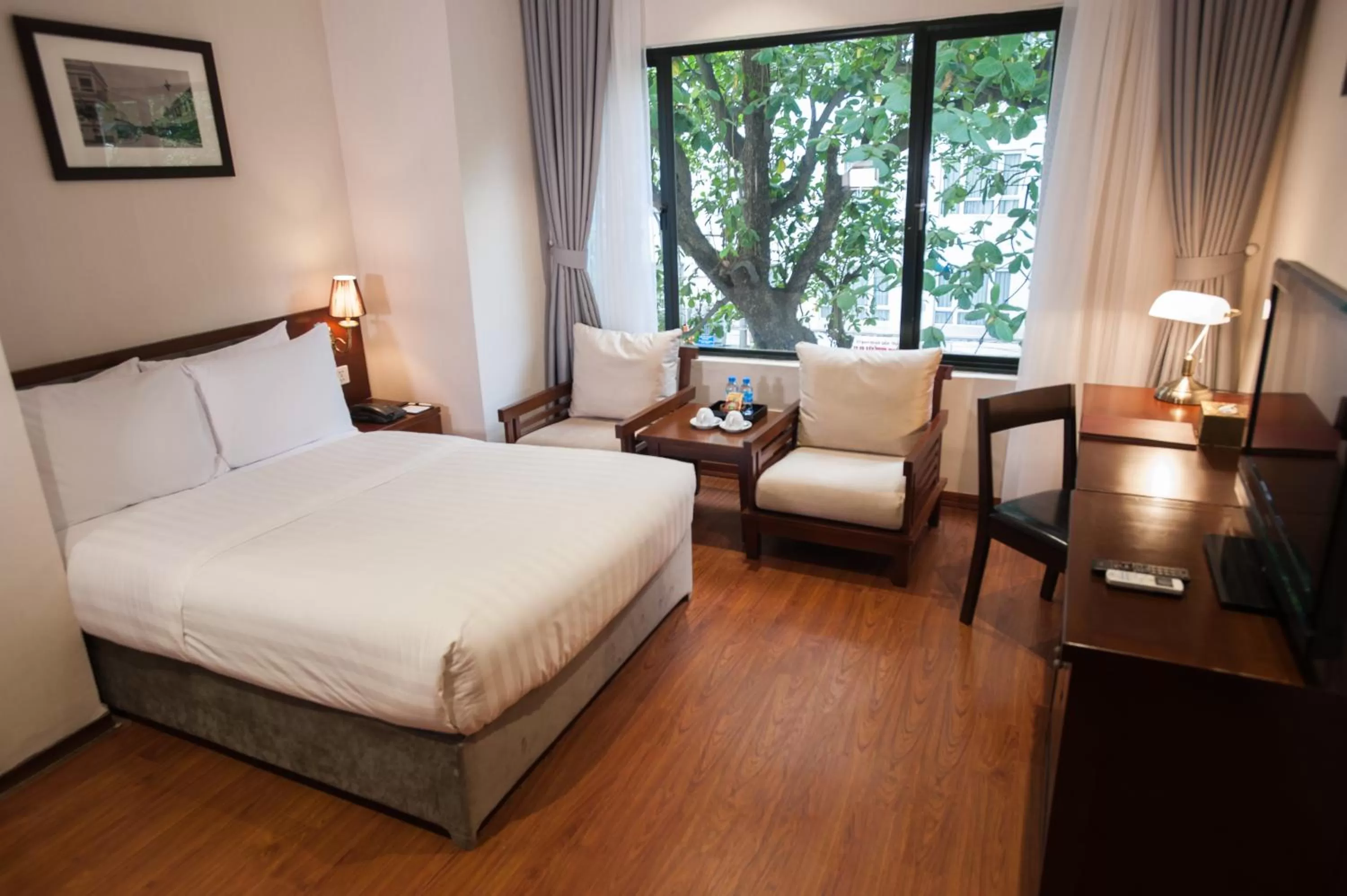 Bed in Mon Regency Hotel