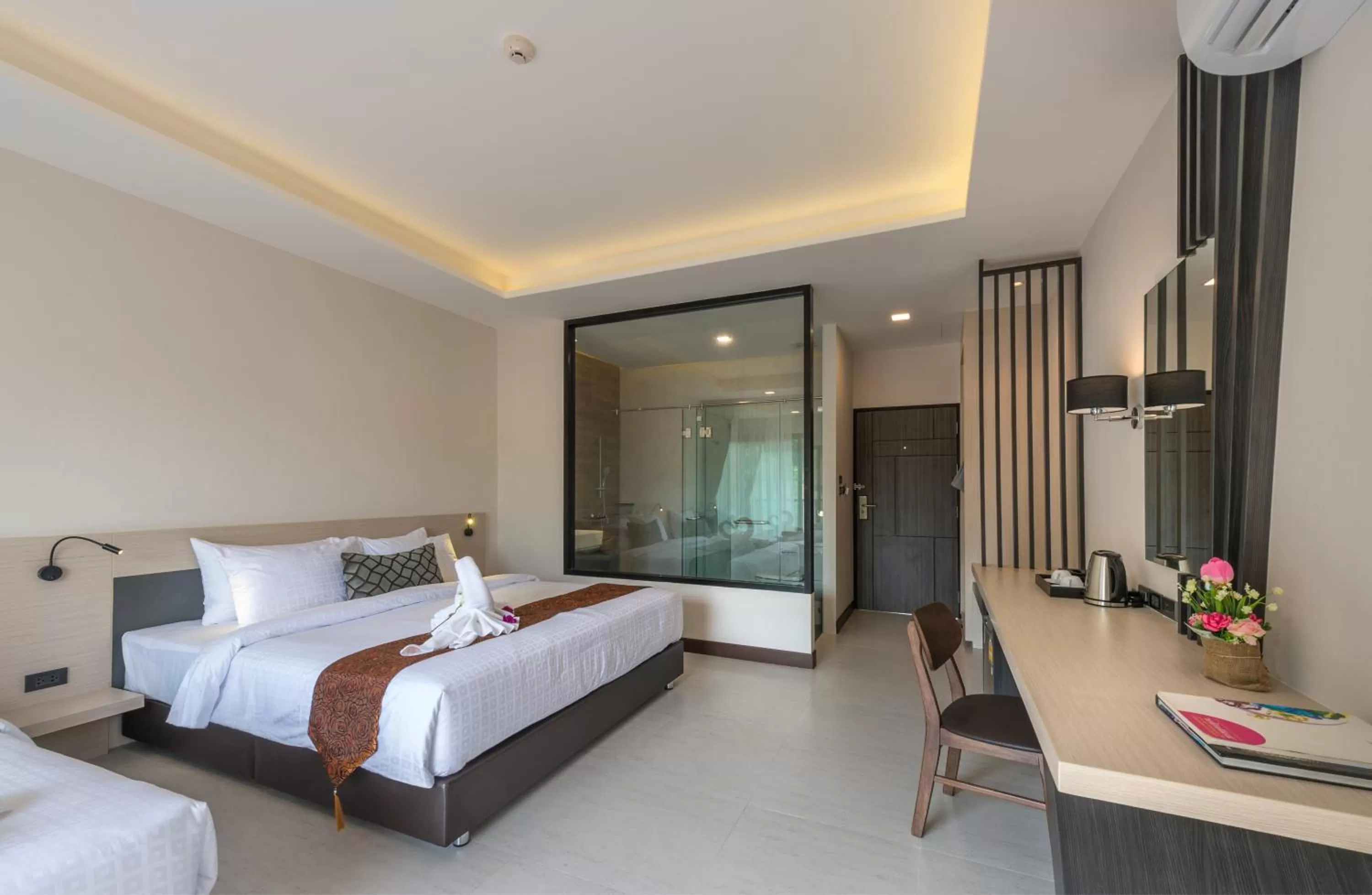 Bed in Cher​mantra​ Aonang​ Resort & Pool​ Suite