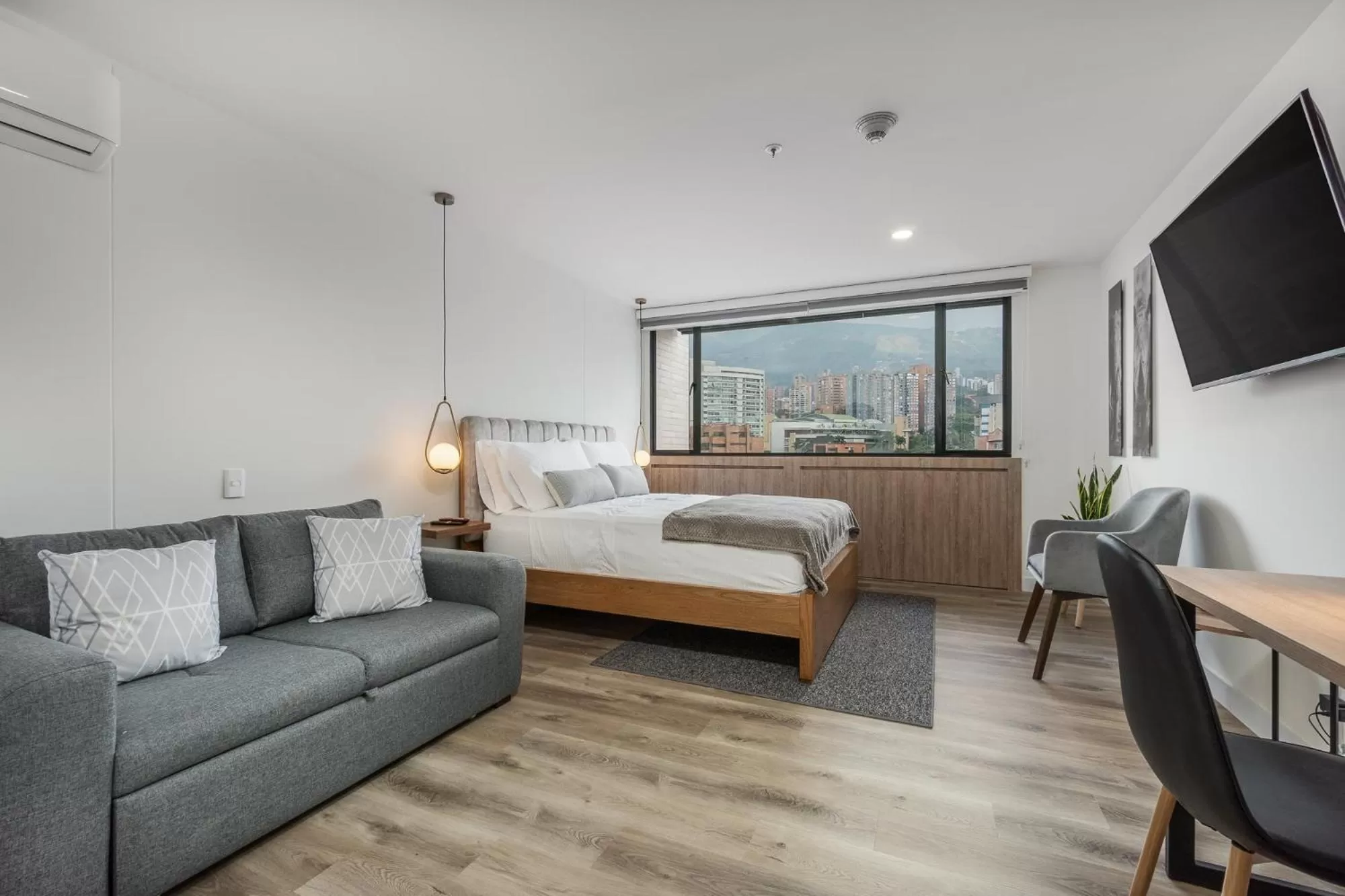 Photo of the whole room, Bed in Apartamentos Go Living & Suites by HOUSY HOST