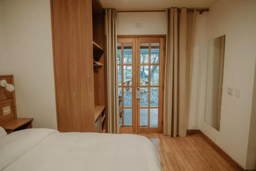 Bed in La Brume Pousada