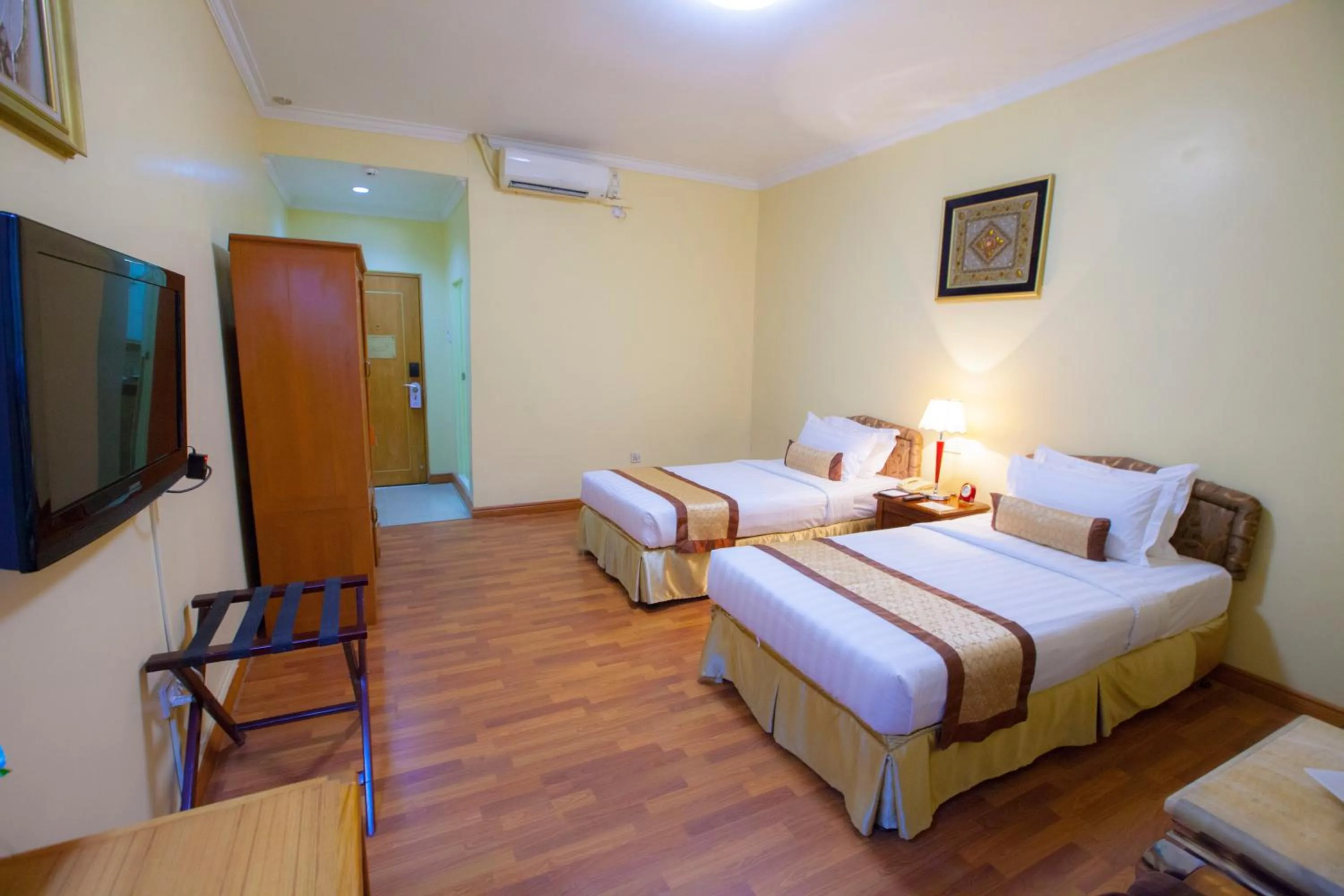 Bed in Grand Palace Hotel