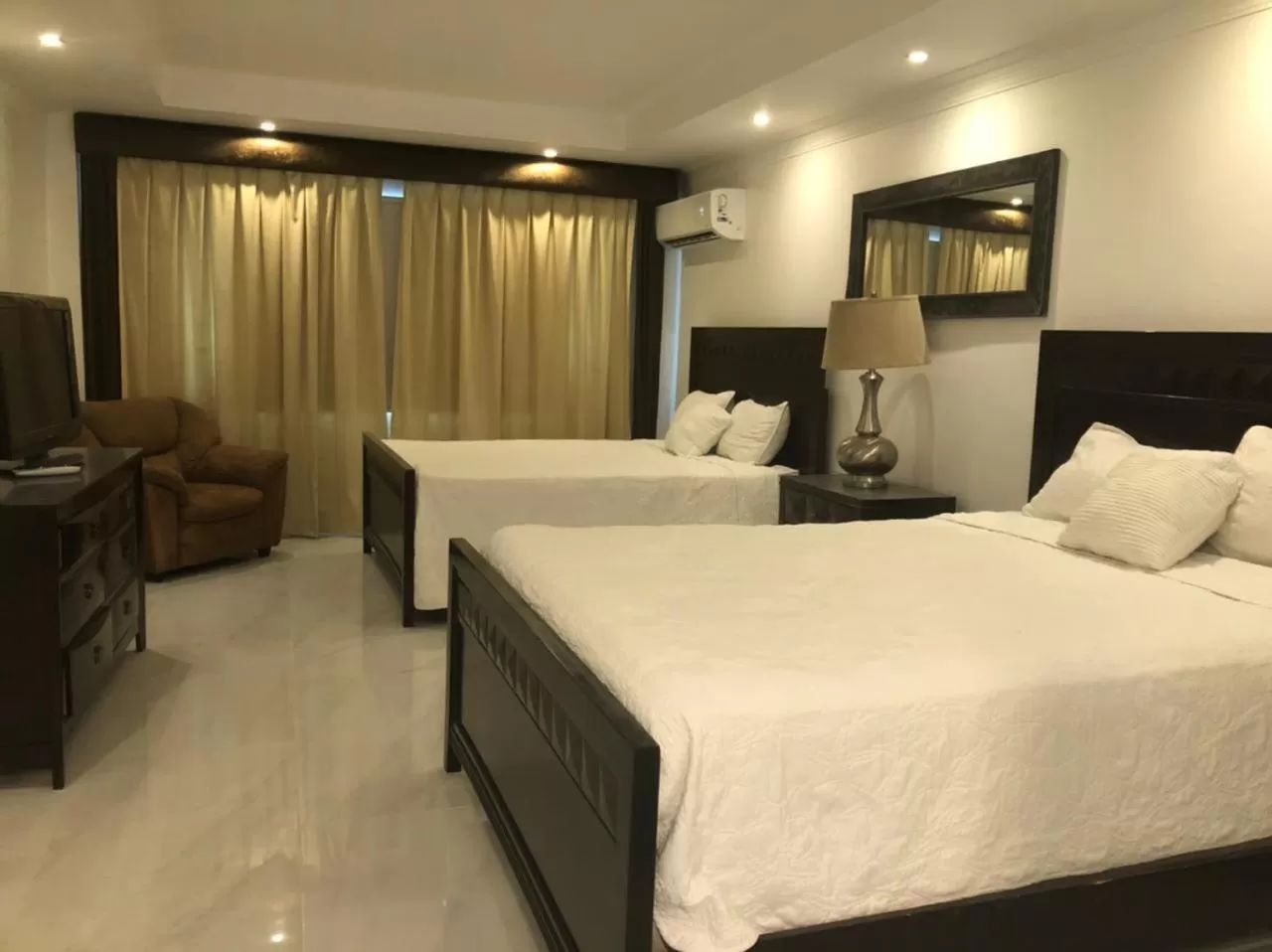 Bed in Golden House Hotel & Convention Center