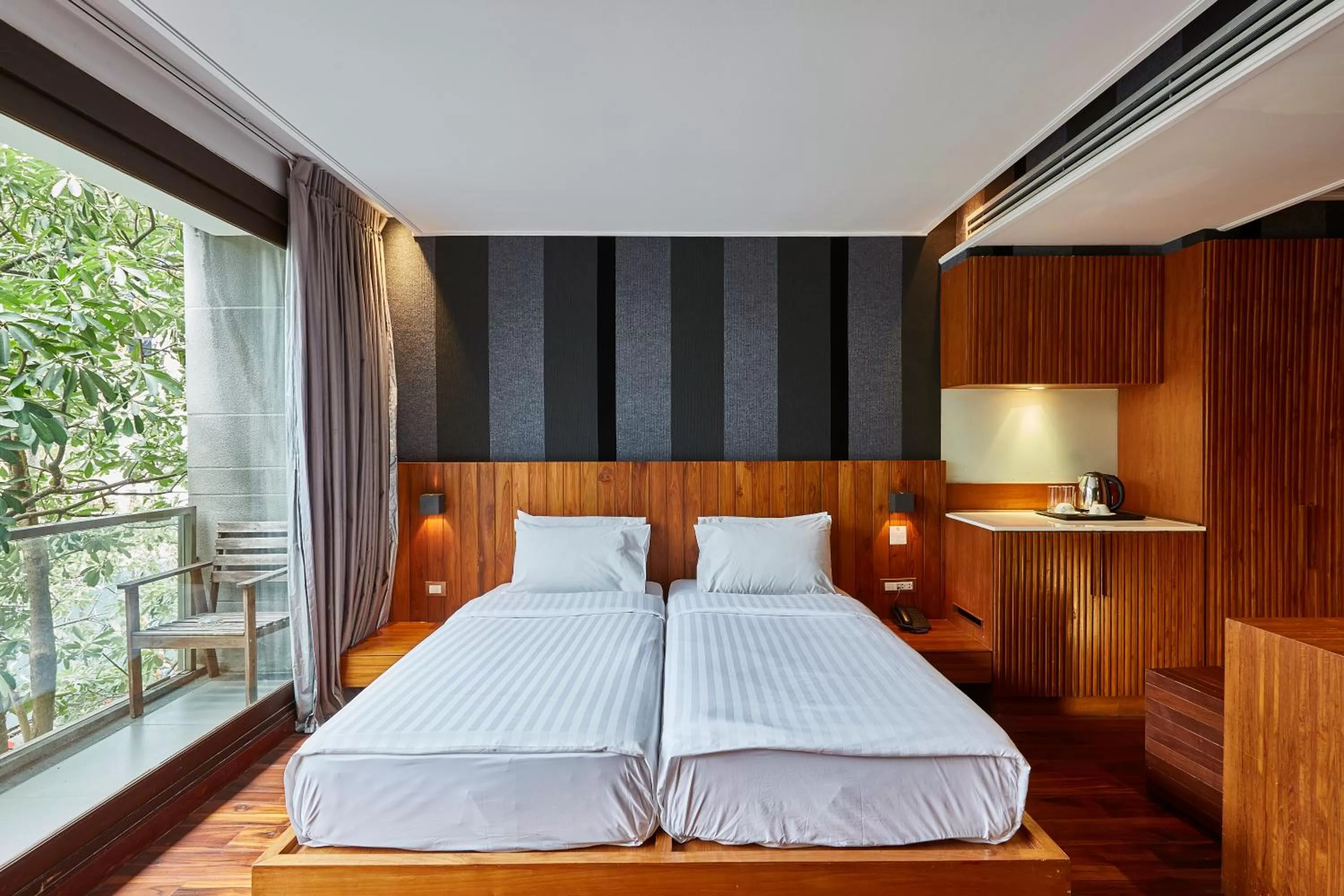 Bed in LUXX Langsuan Hotel - SHA Plus