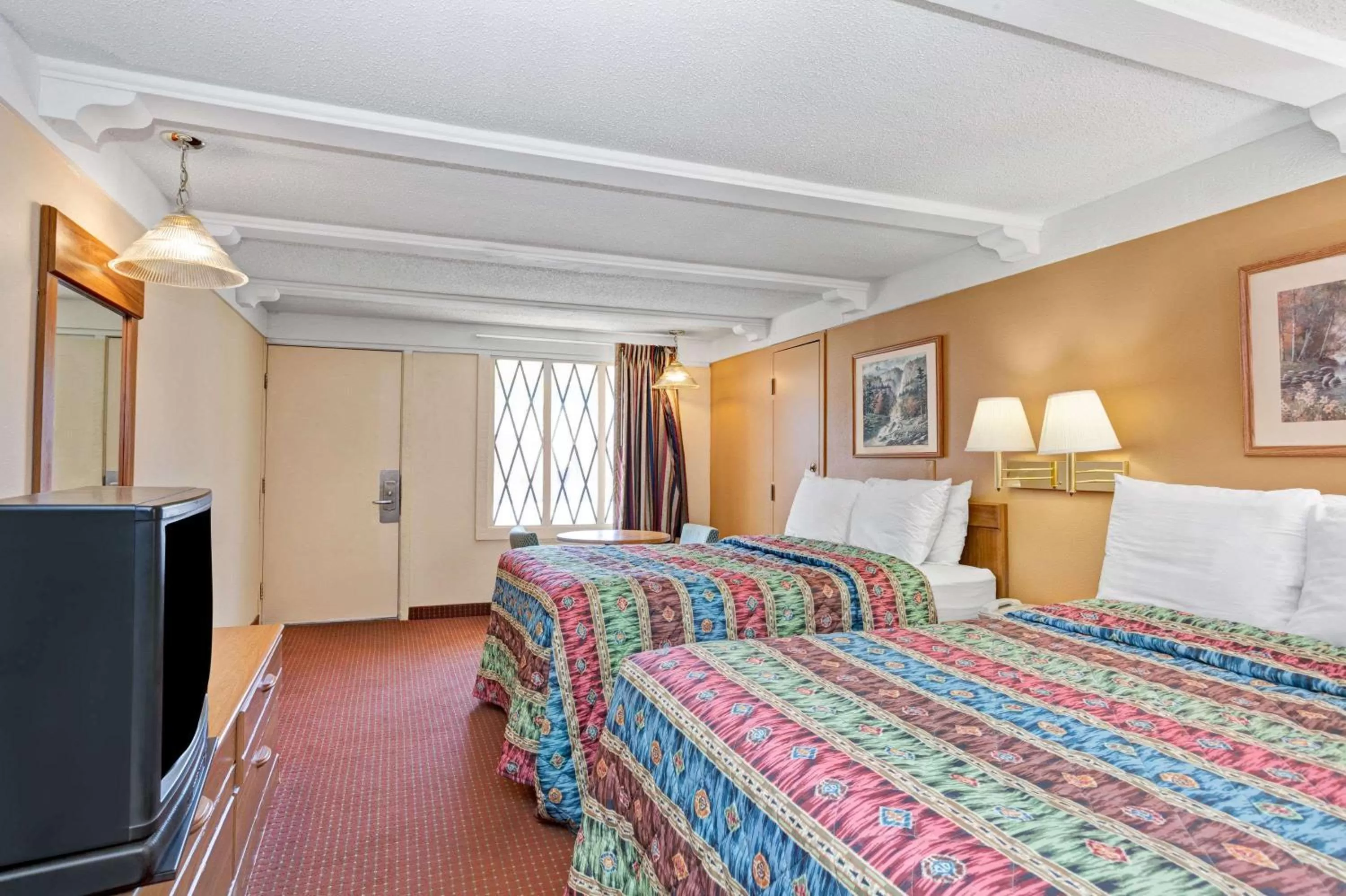 Photo of the whole room, Bed in Knights Inn Charleston West Virginia