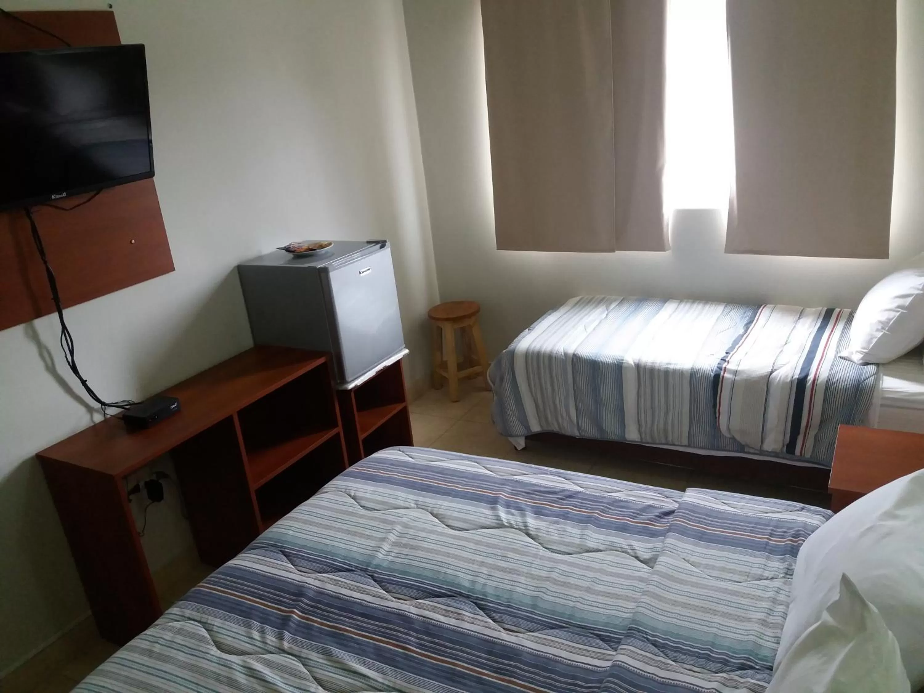 Bed in Madame Lynch Hotel Asuncion