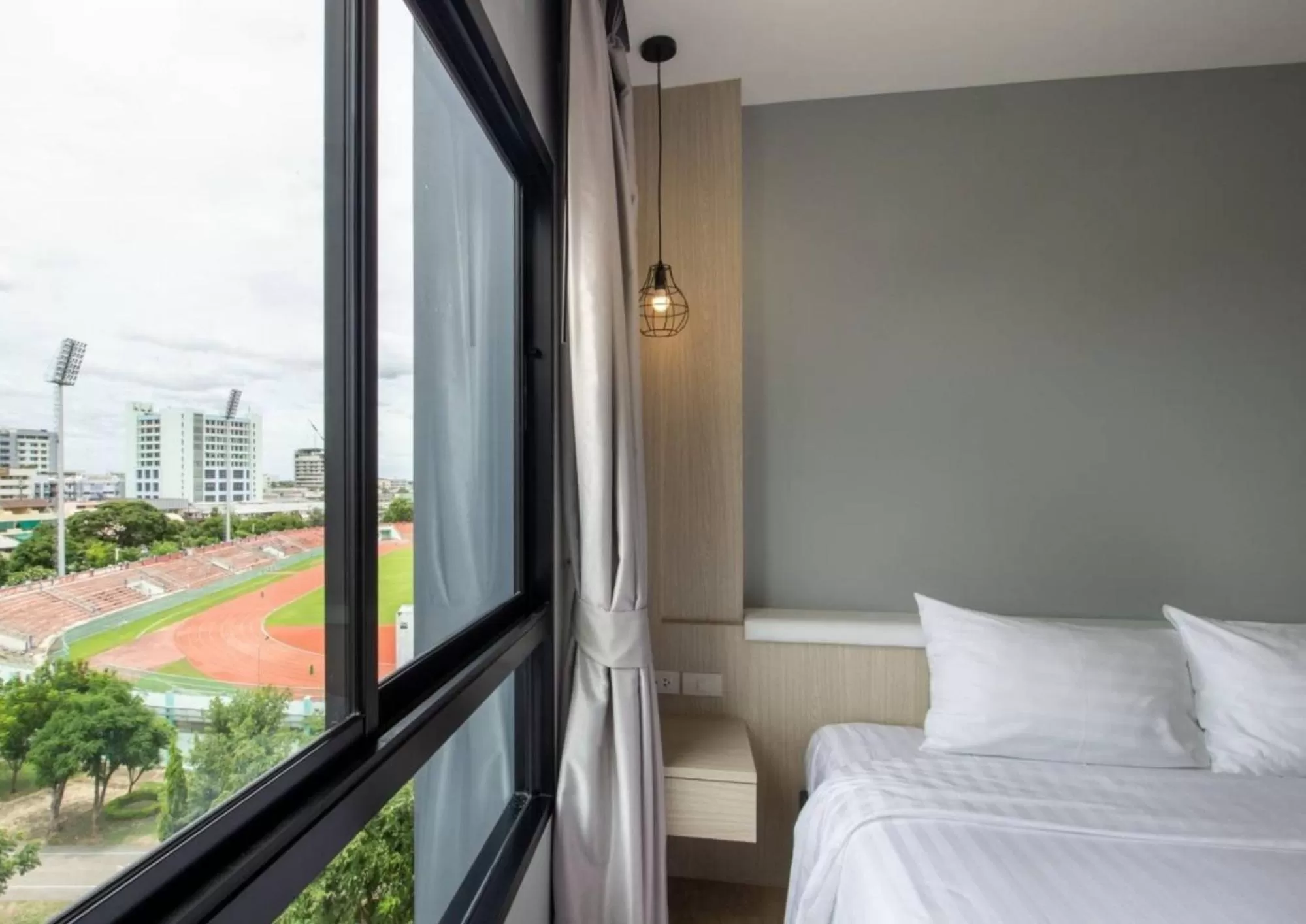 View (from property/room), Bed in Napa Hotel Ratchaburi