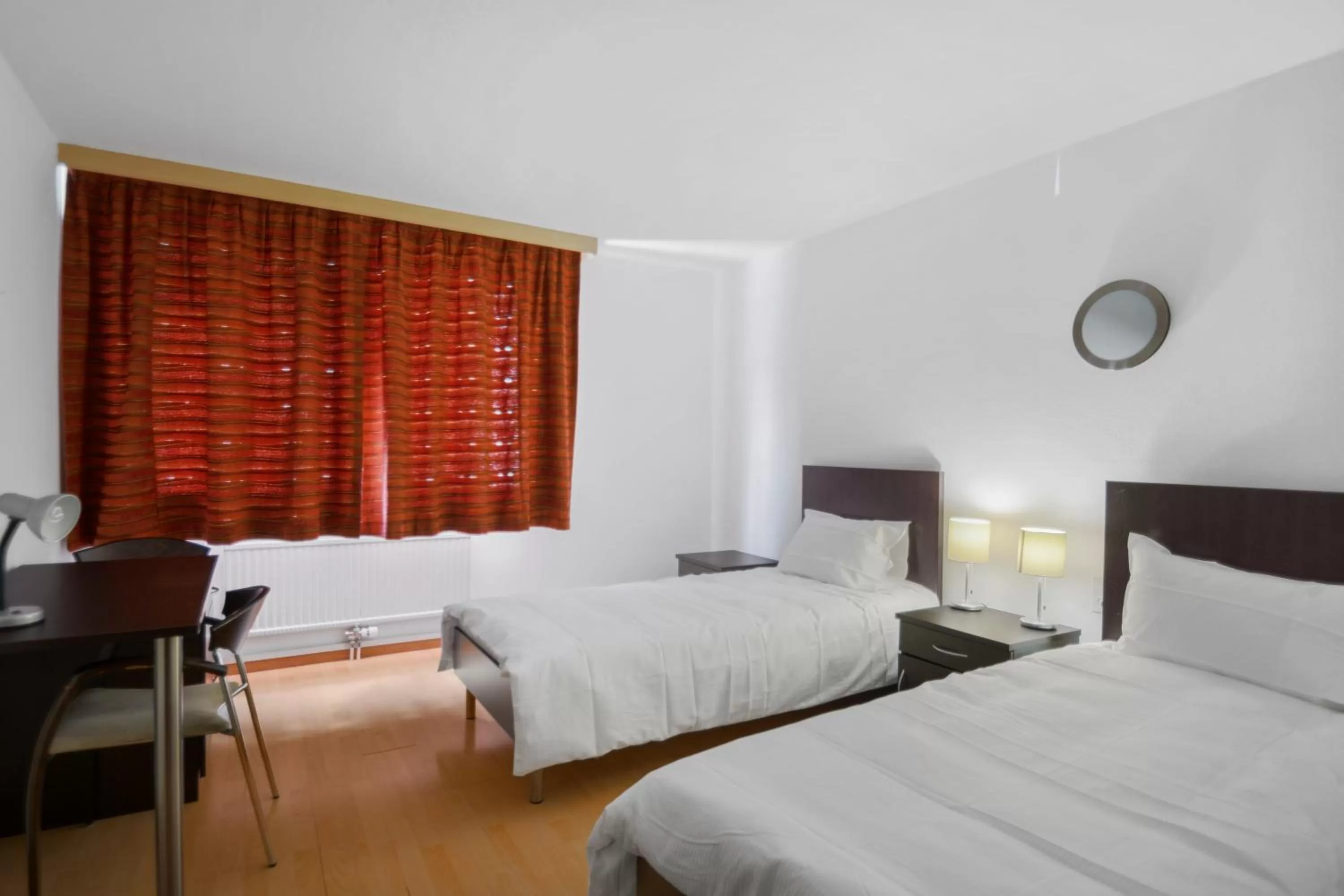 Bed in Neuchâtel City Hôtel