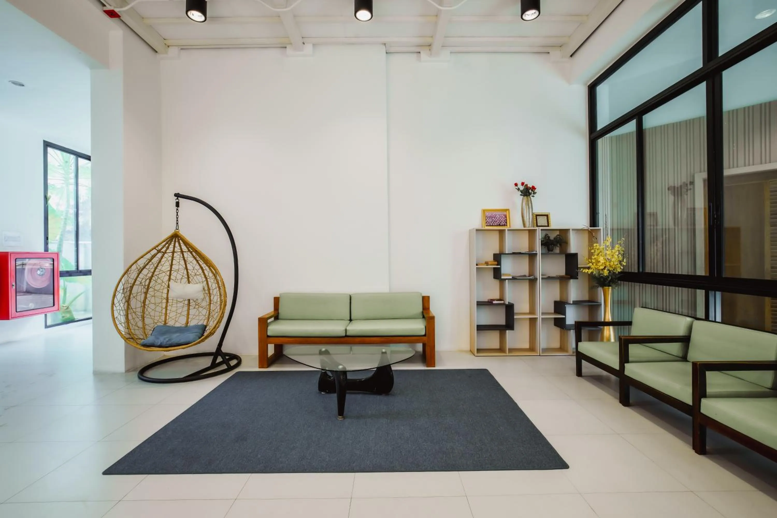 Communal lounge/ TV room in The Lunar Patong