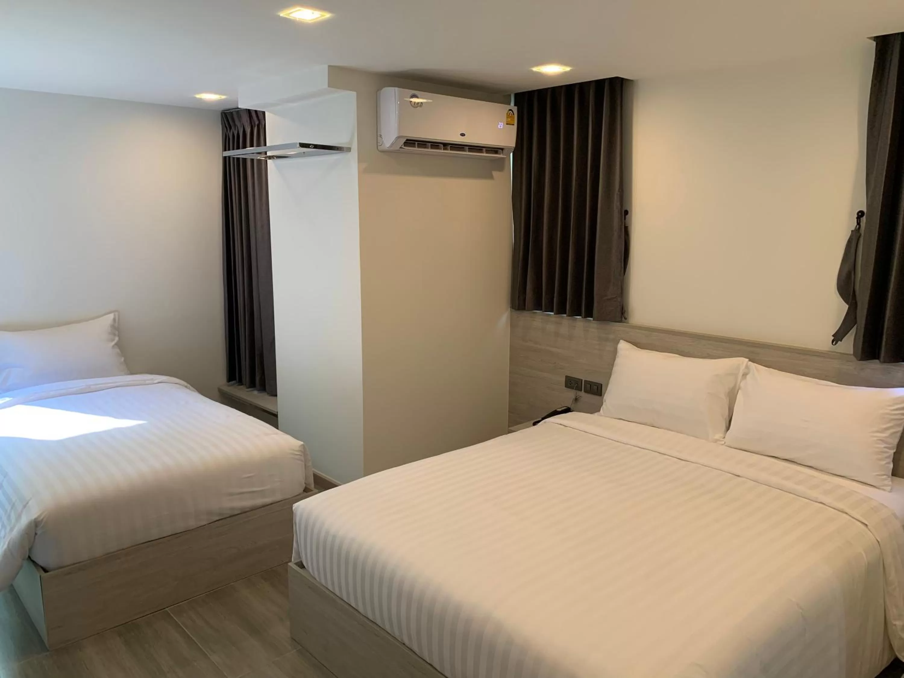 Bed in Thana Wisut Hotel