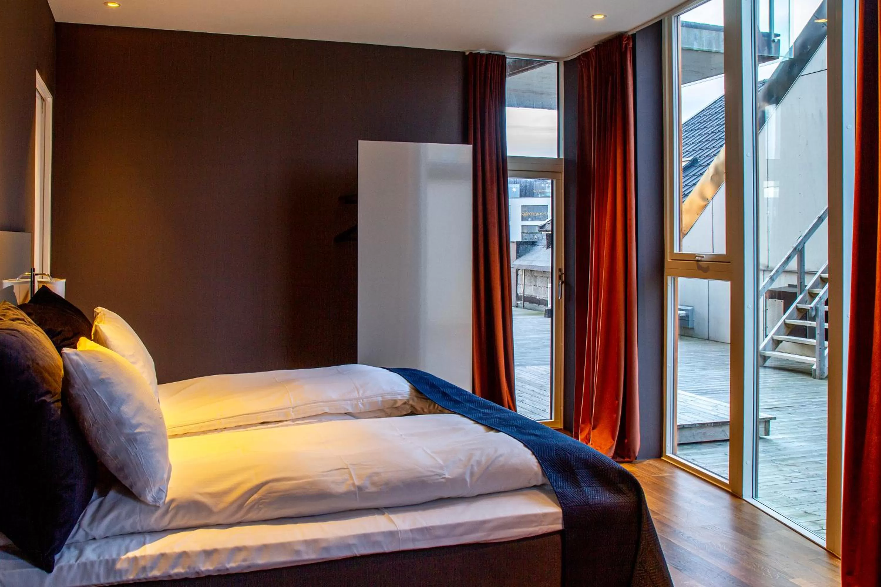 Bed in Nordis Apartments