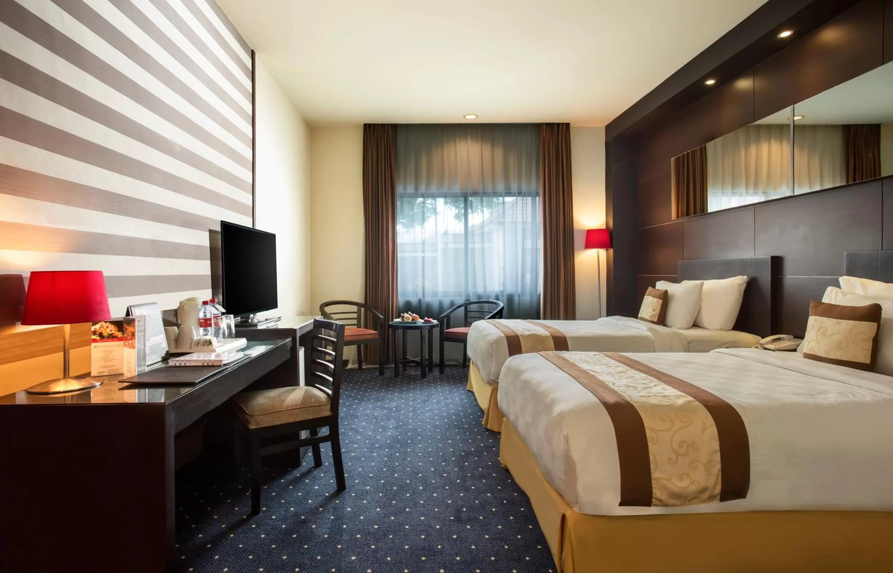 TV and multimedia, Bed in Swiss-Belhotel Silae Palu