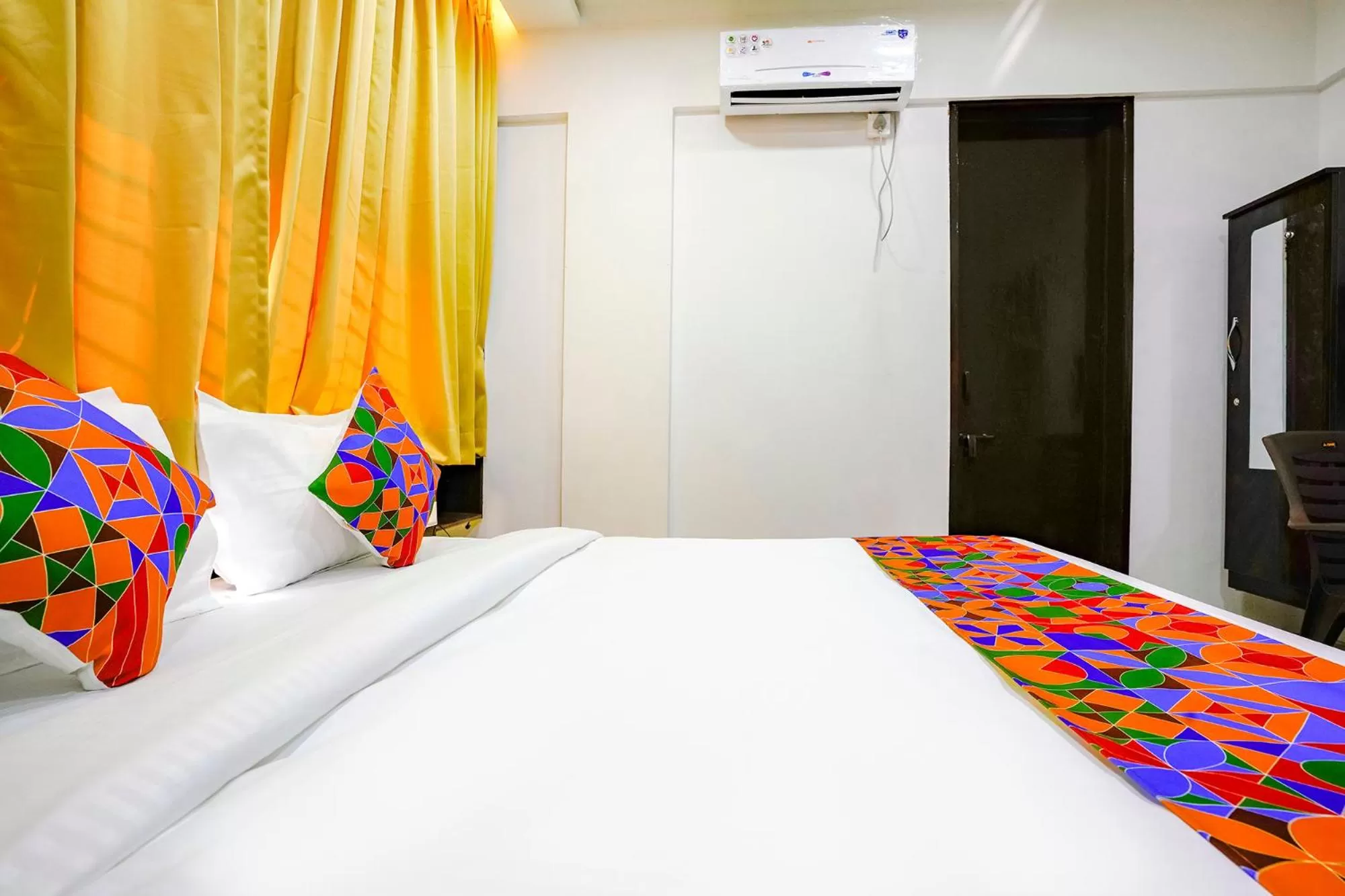 Bed in FabHotel Woods Regency