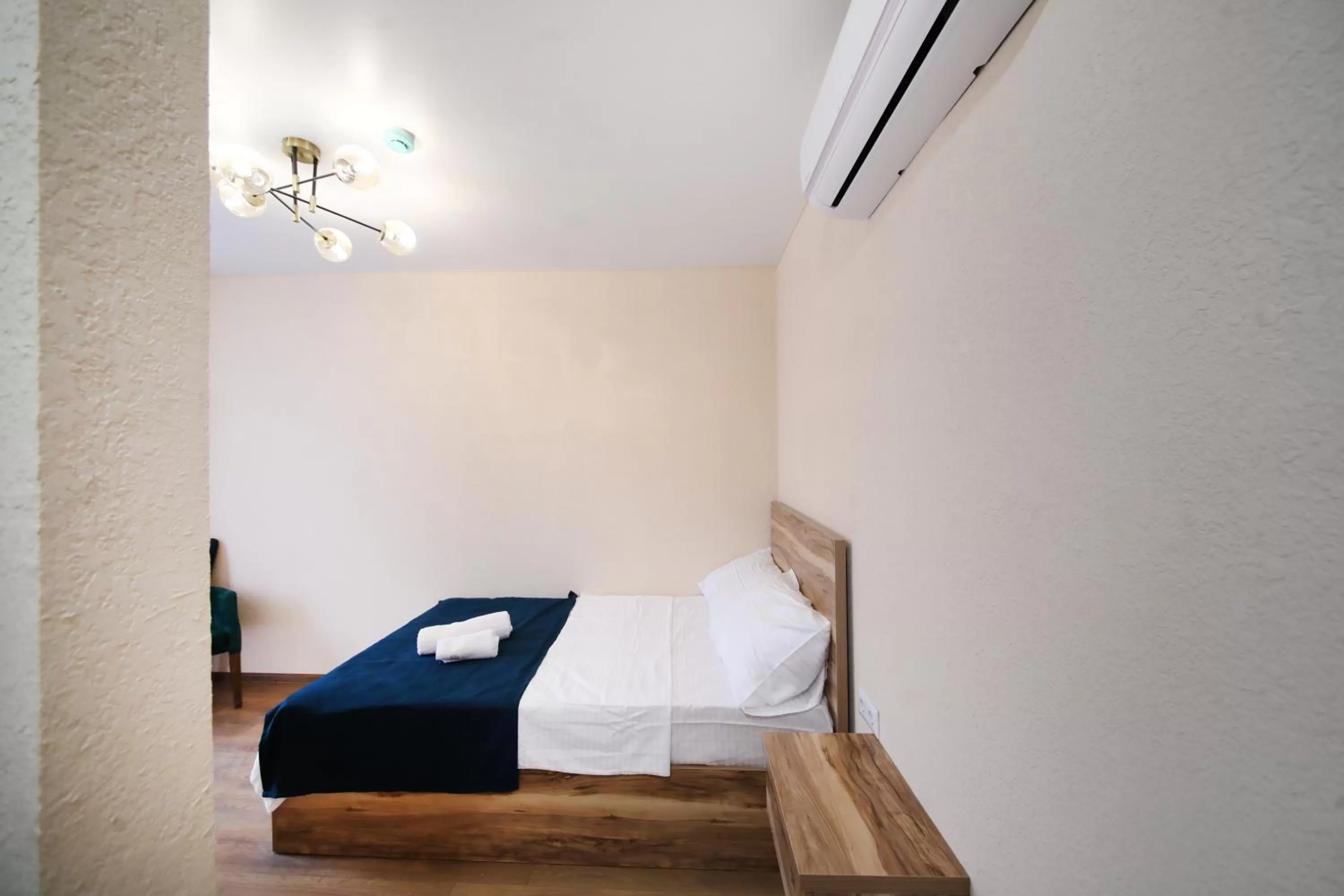 Bed in Bessarion Boutique Hotel