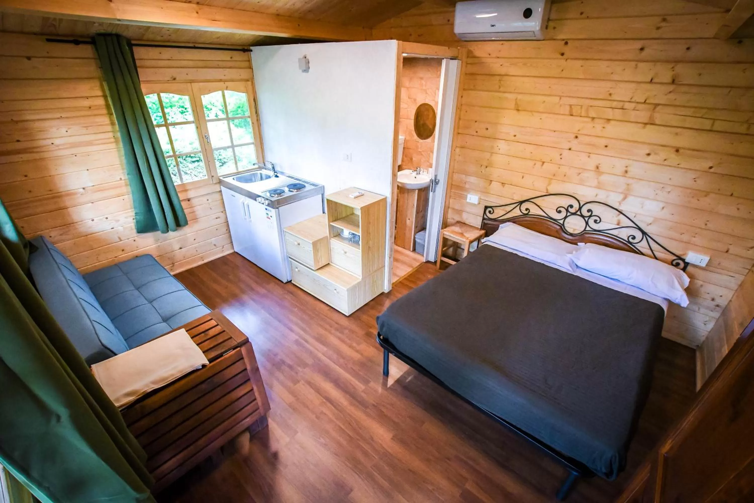 Bed in Albavillage Rooms & Camping