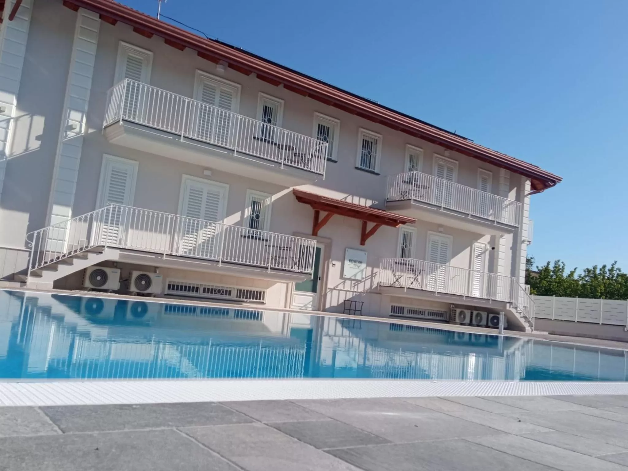 Property building, Swimming Pool in Rosy's House