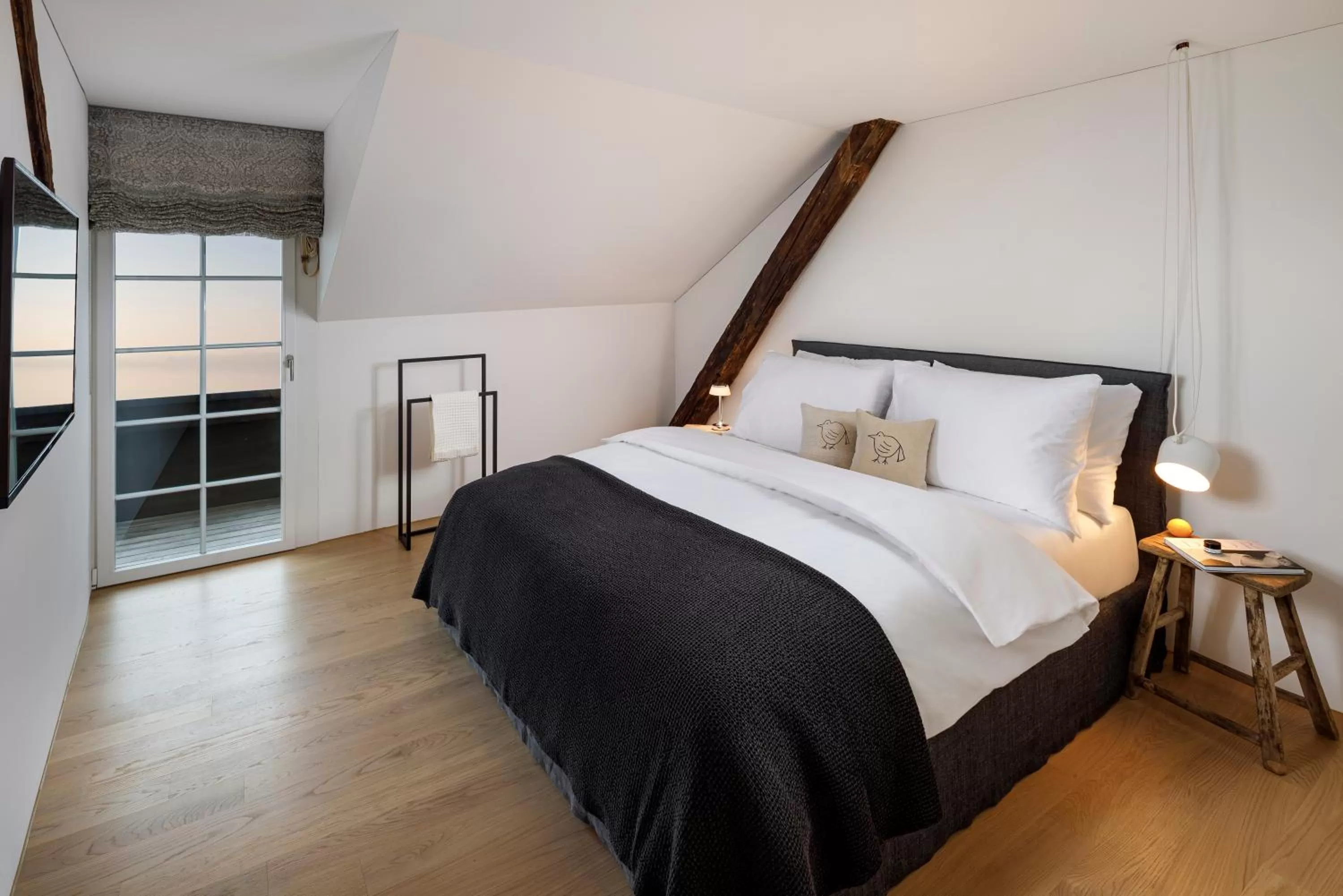 Bed in La Colombe Boutique Hotel