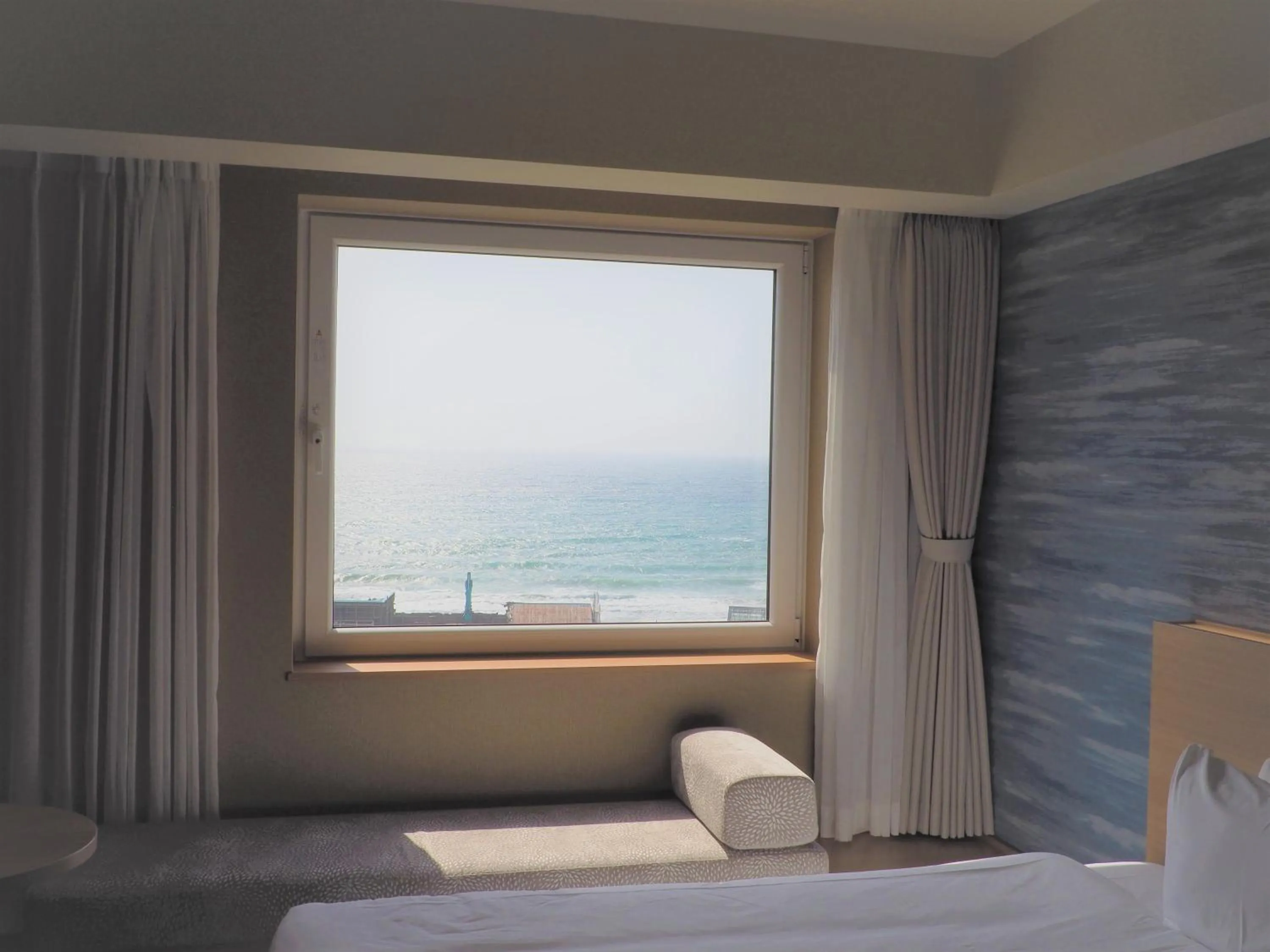 View (from property/room), Bed in Hakodate Yunokawa Onsen Umi to Akari Hewitt Resort