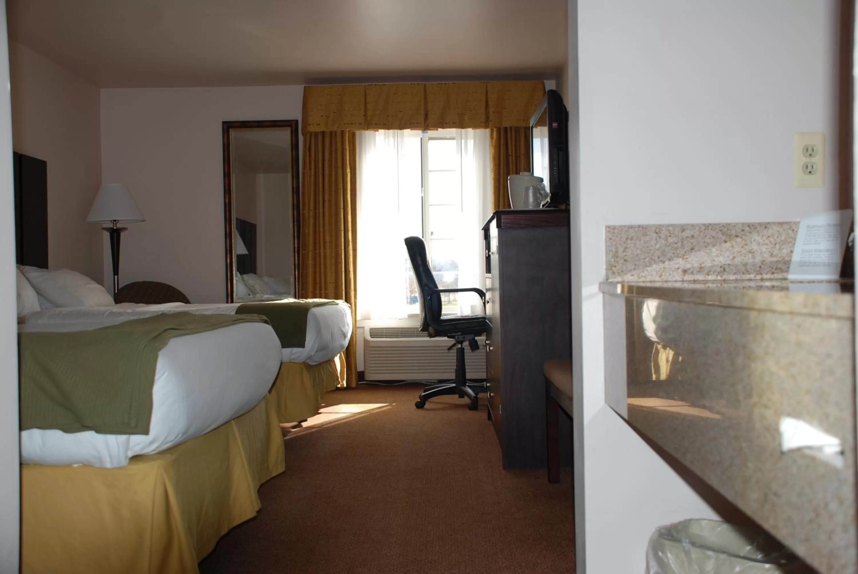 Suite with Two Queen Beds and Mobility Accessible Tub in Holiday Inn Express Hotel & Suites East Lansing, an IHG Hotel