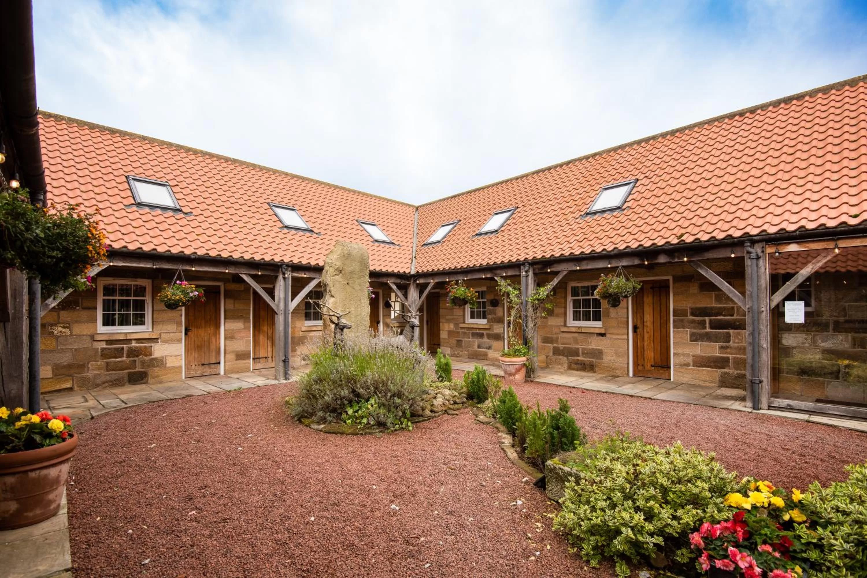 Garden, Property Building in The Stables - The Inn Collection Group
