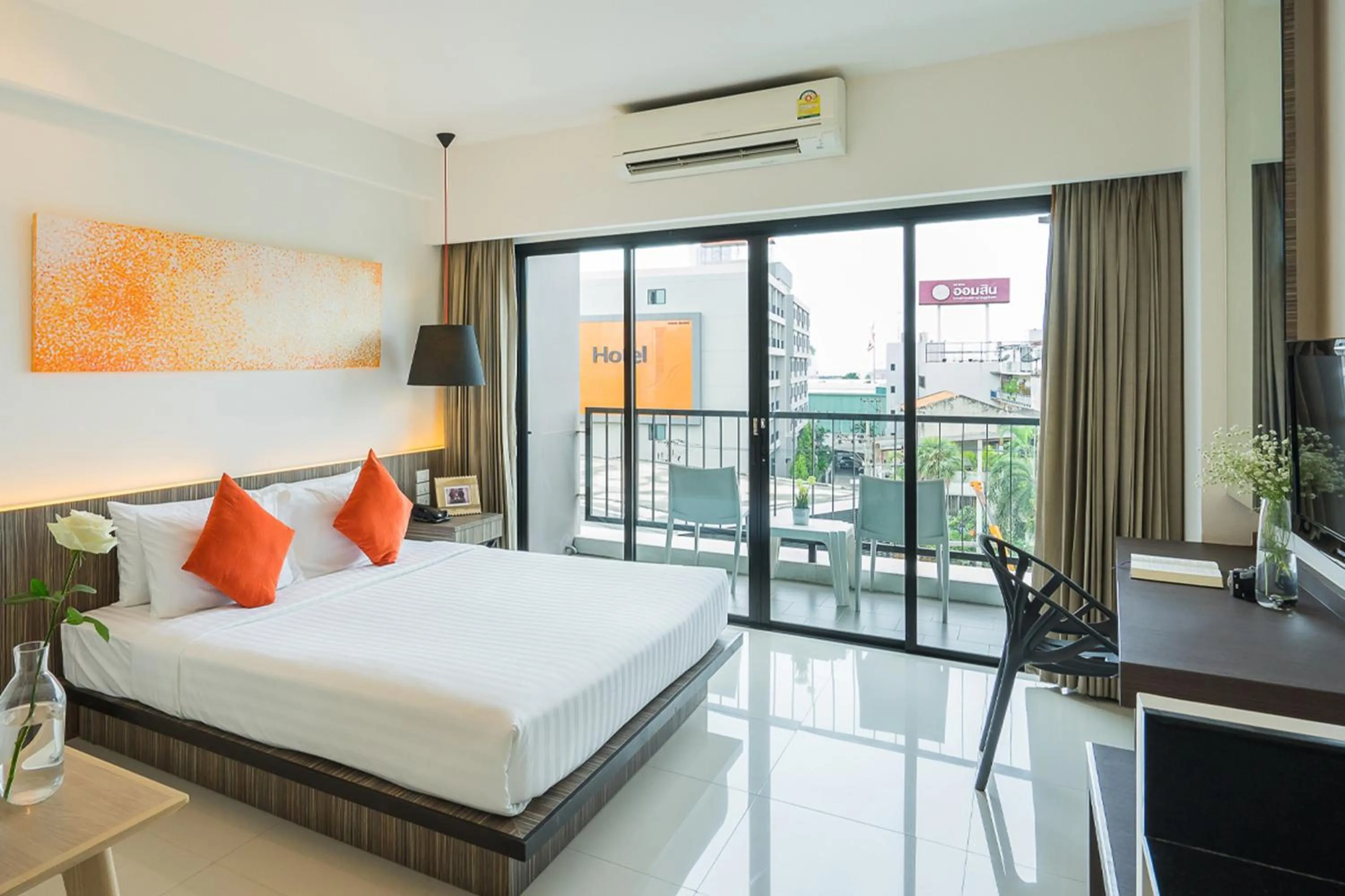 Bed in Hotel J Residence Pattaya