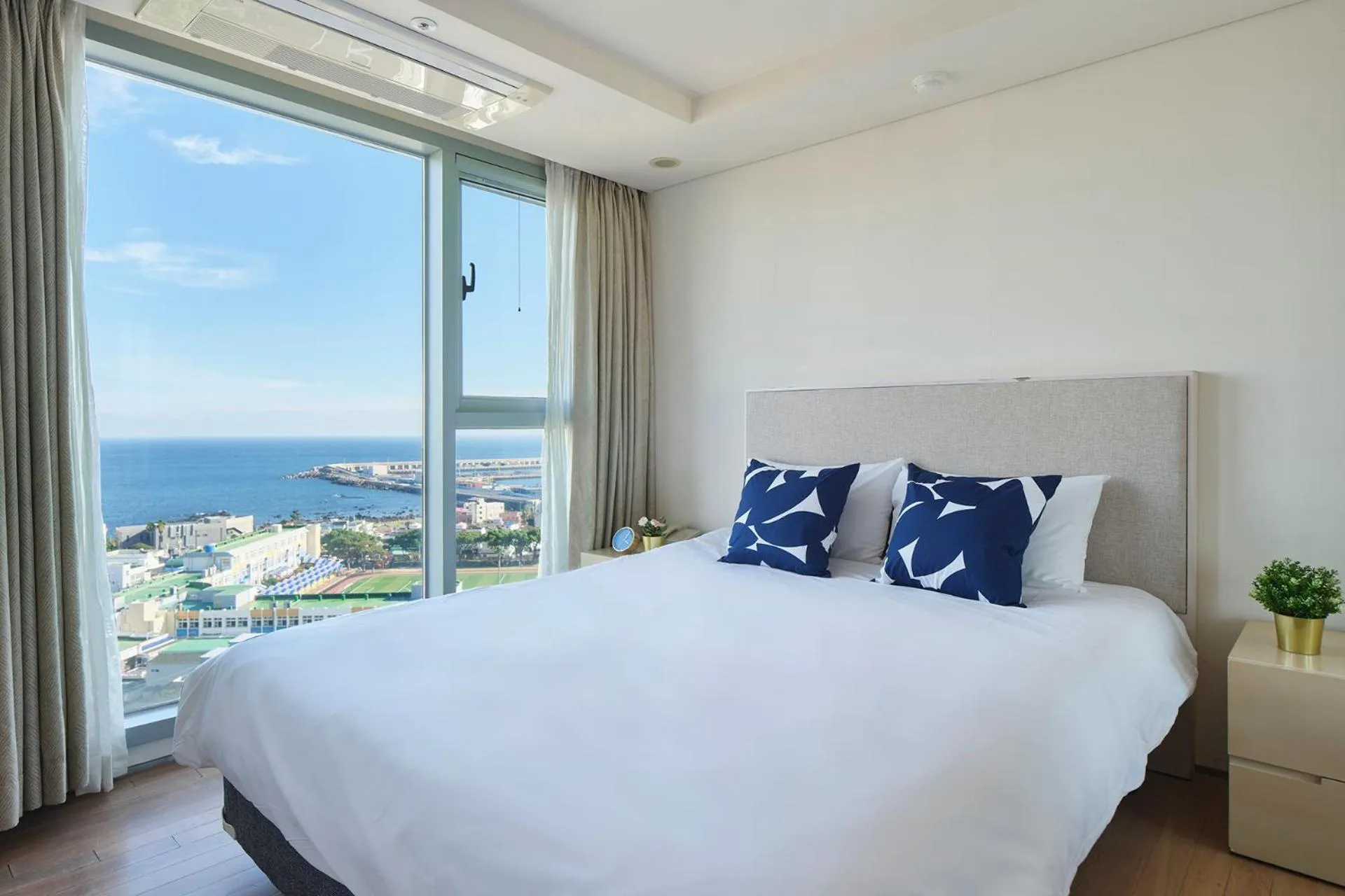 Bed in The Island Blue Hotel