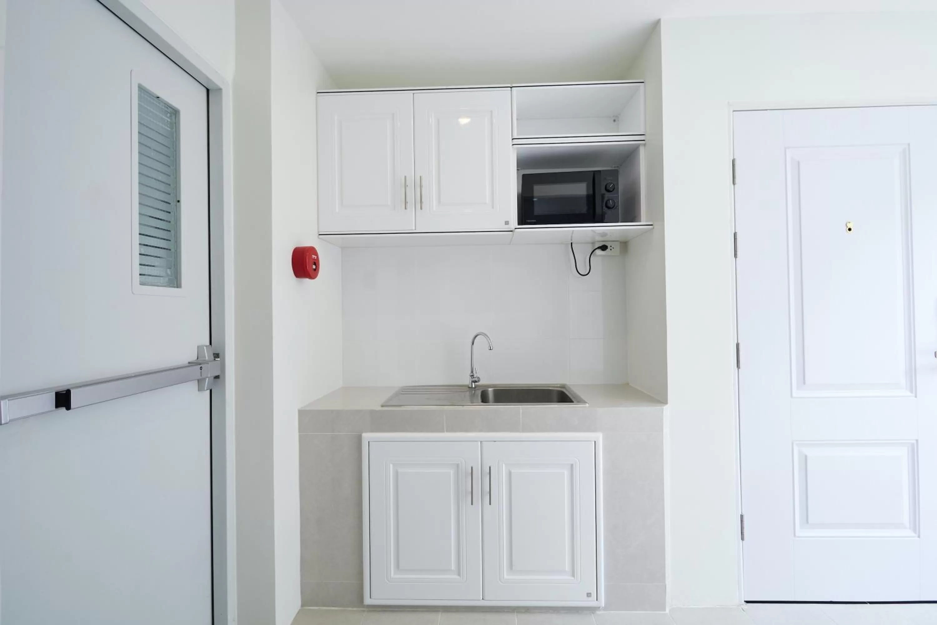 Kitchen or kitchenette in Rose Apple Hotel