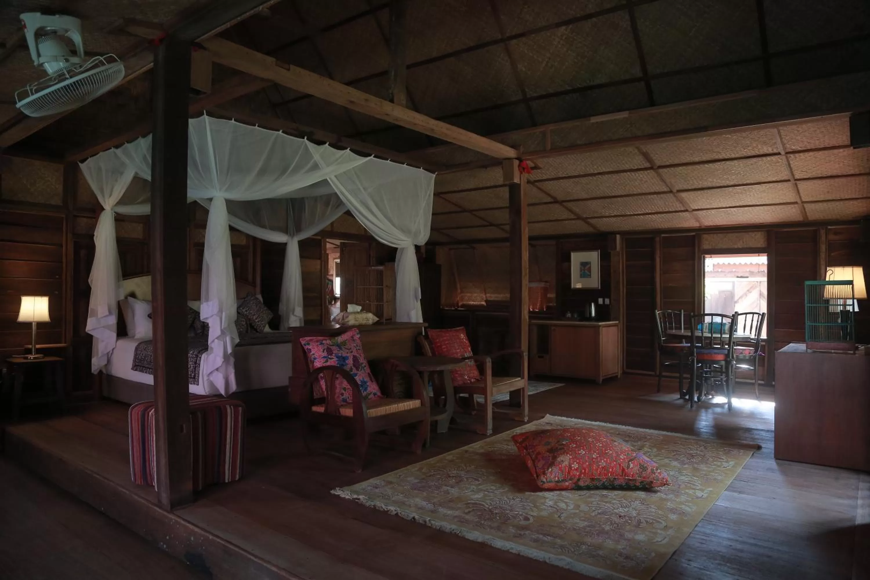 Bed in Kunang Kunang Heritage Villas