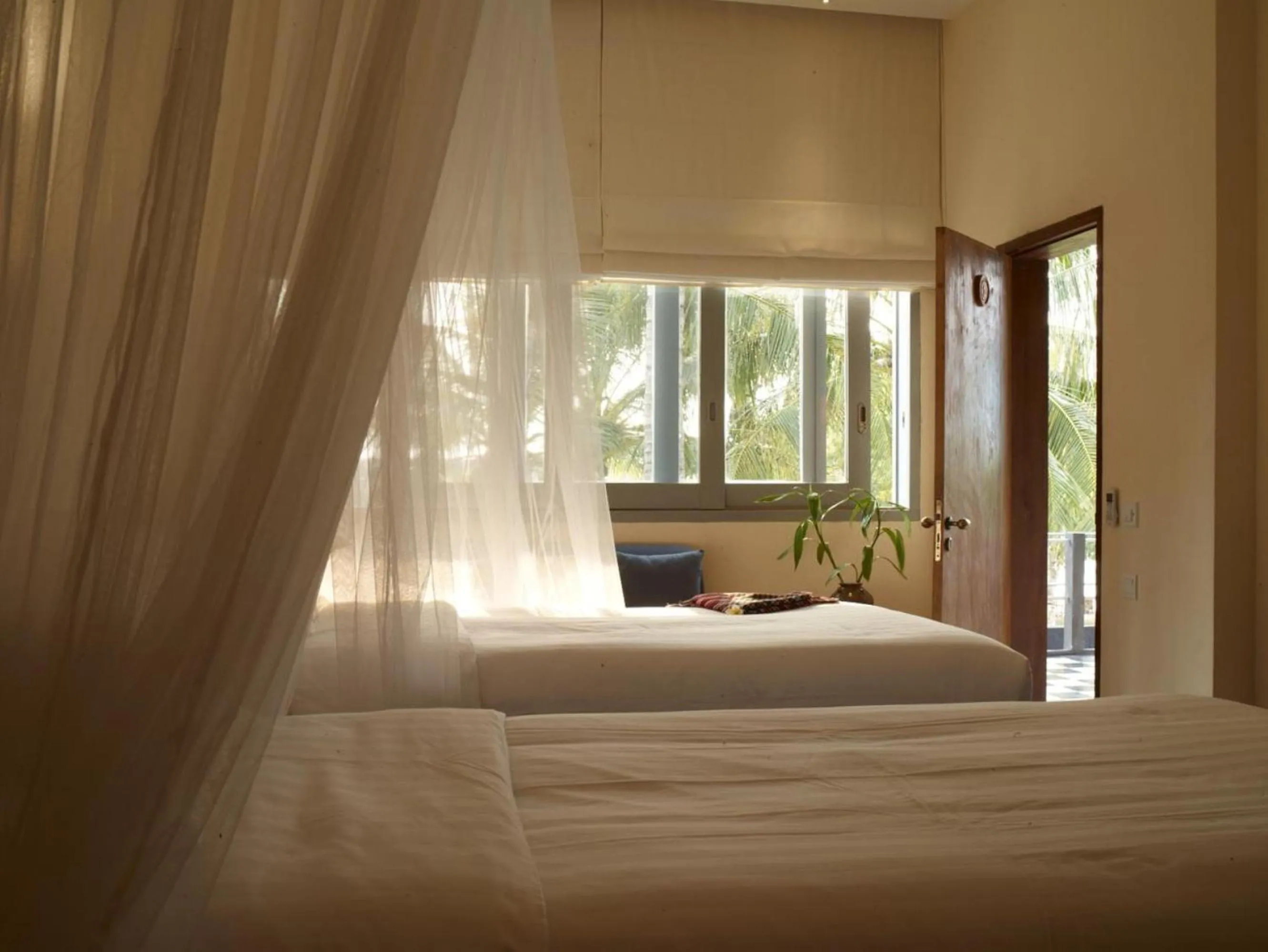 Bed in Knai Bang Chatt Resort