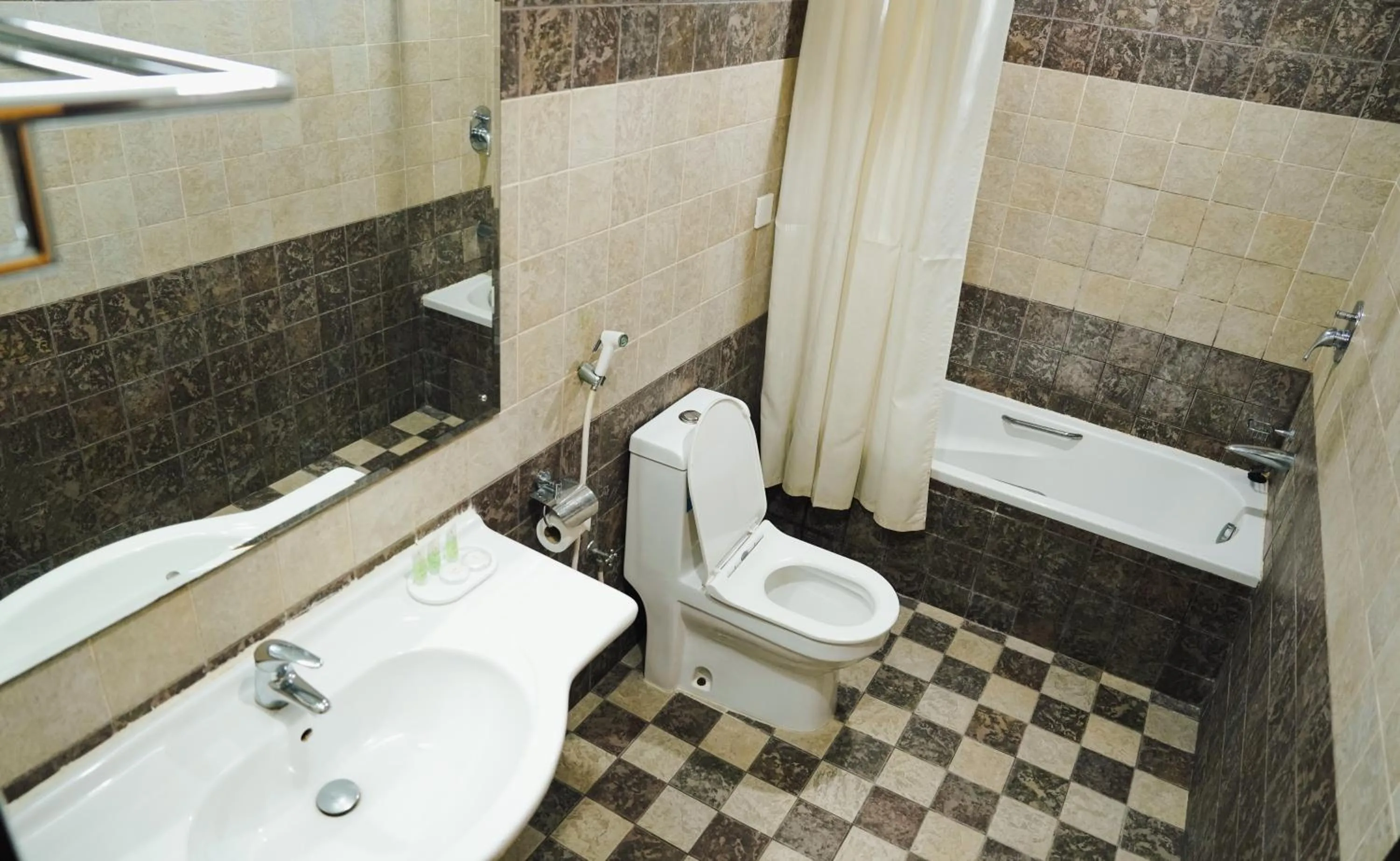 Shower in Safeer International Hotel By Brothers International