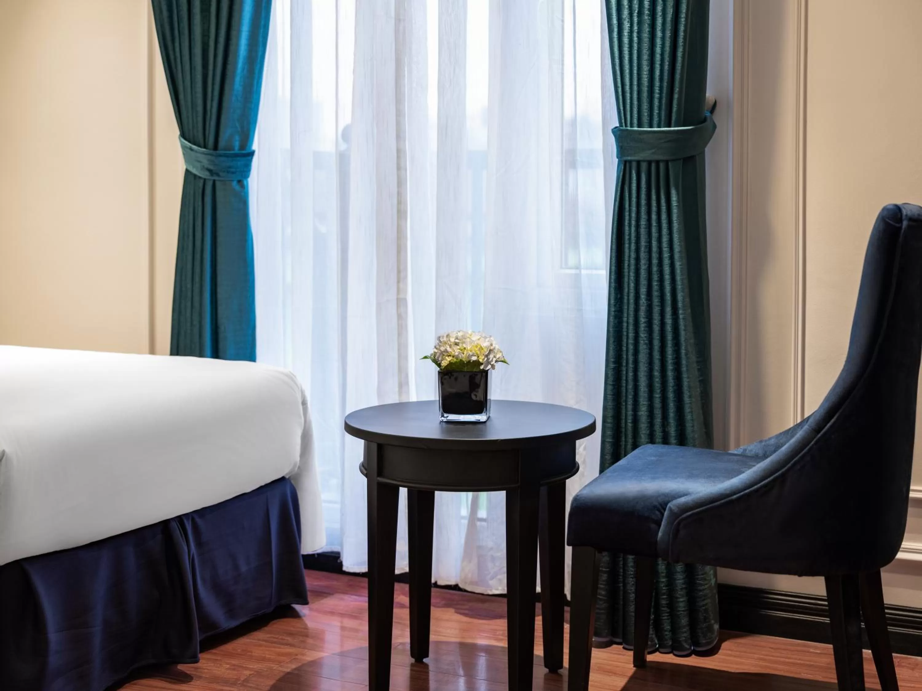 Bed in The Flower Boutique Hotel & Travel