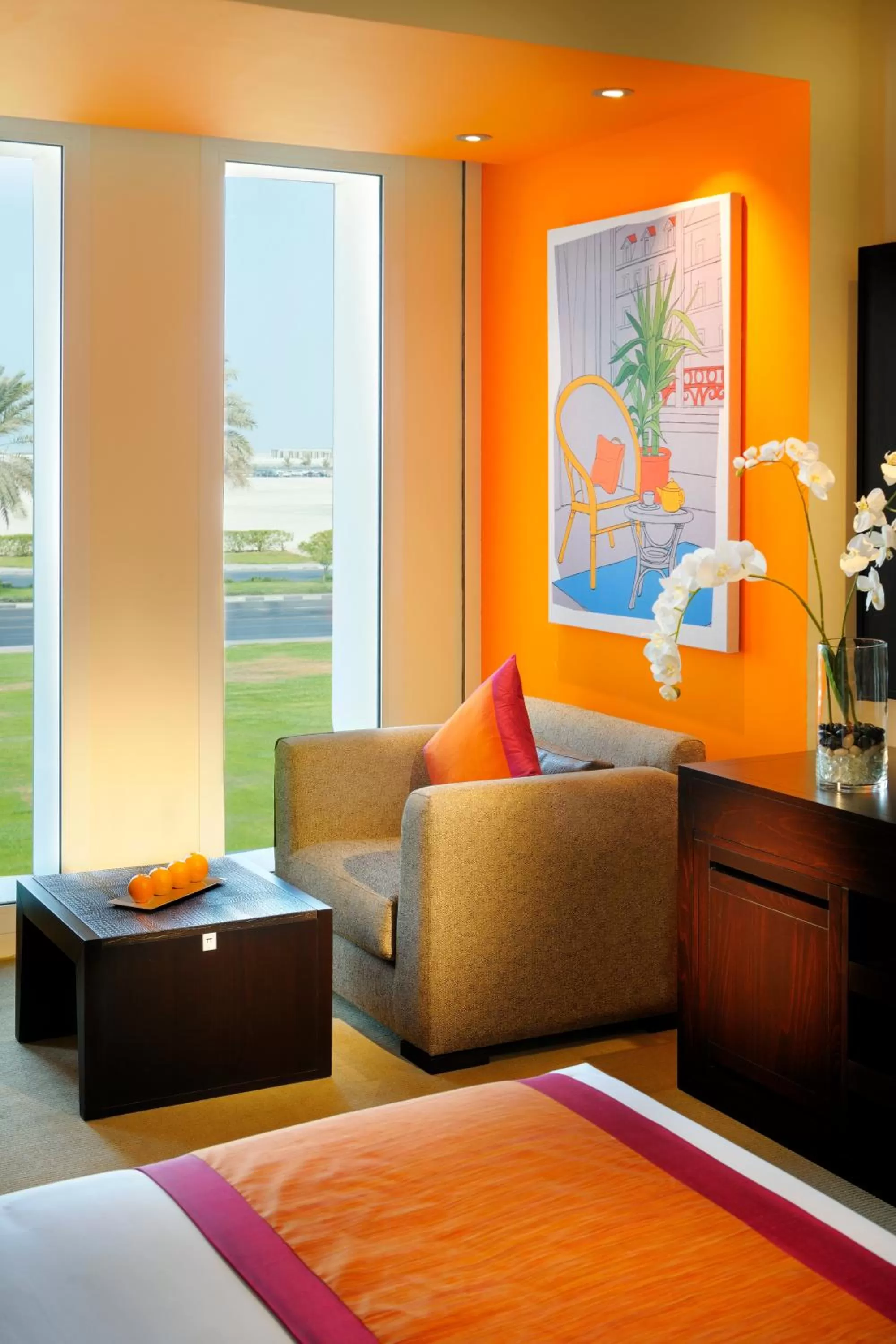 Seating area, Bed in Hues Boutique Hotel