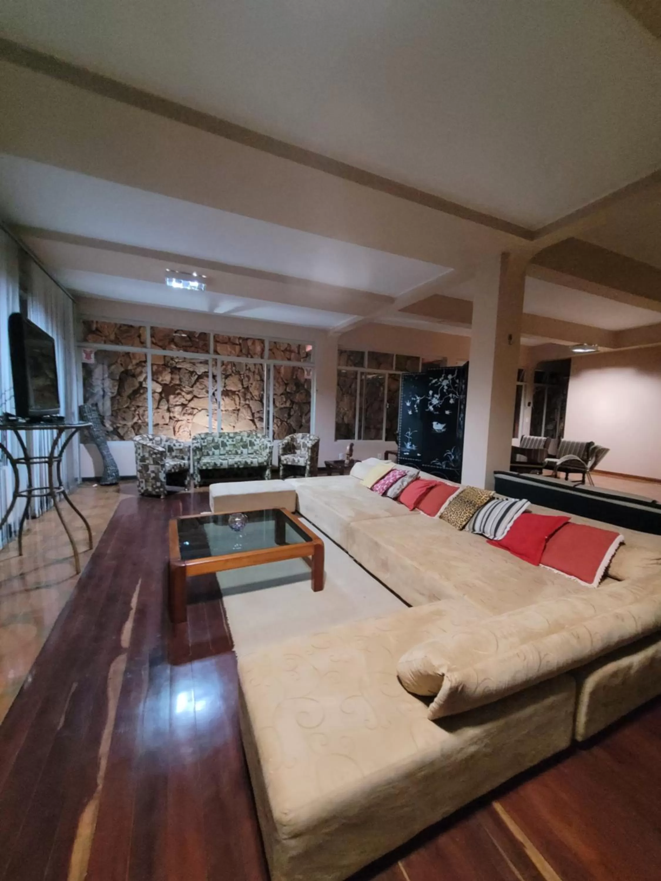 Communal lounge/ TV room, Swimming Pool in KzaZendf Cama e Cafe Asa Sul