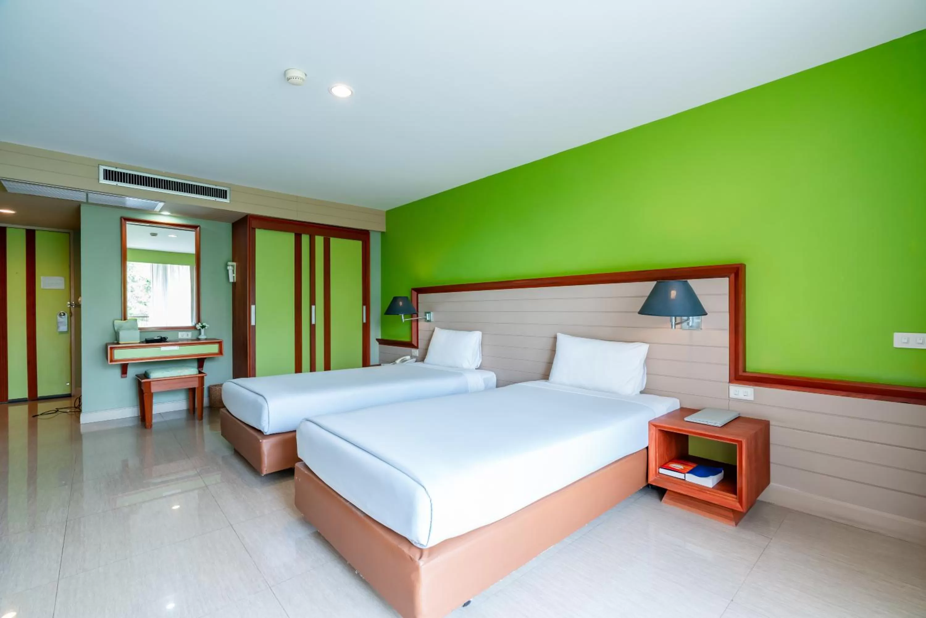 Bed in Long Beach Cha-Am Hotel