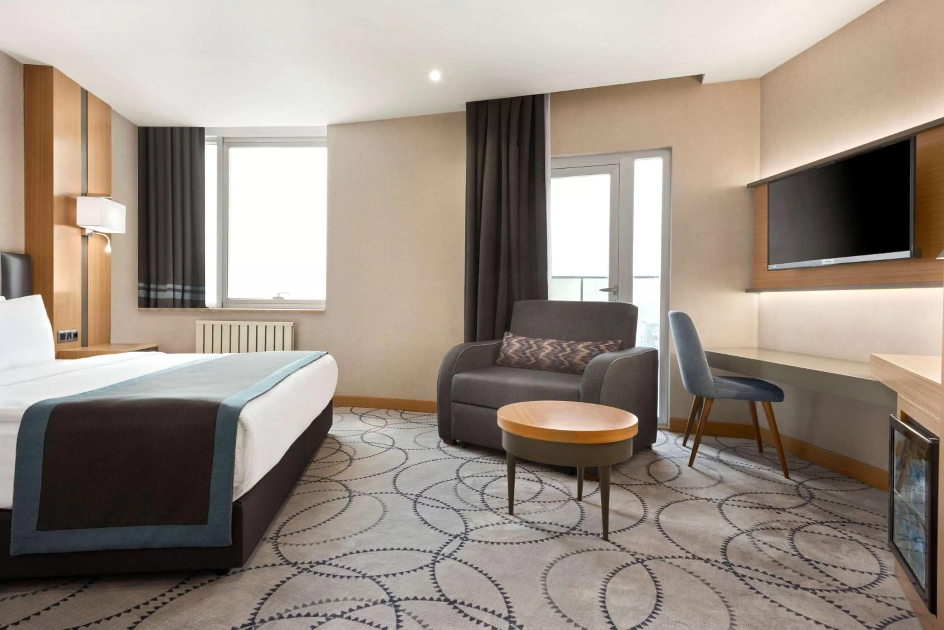 Photo of the whole room, TV/Entertainment Center in Ramada By Wyndham Nilufer Bursa