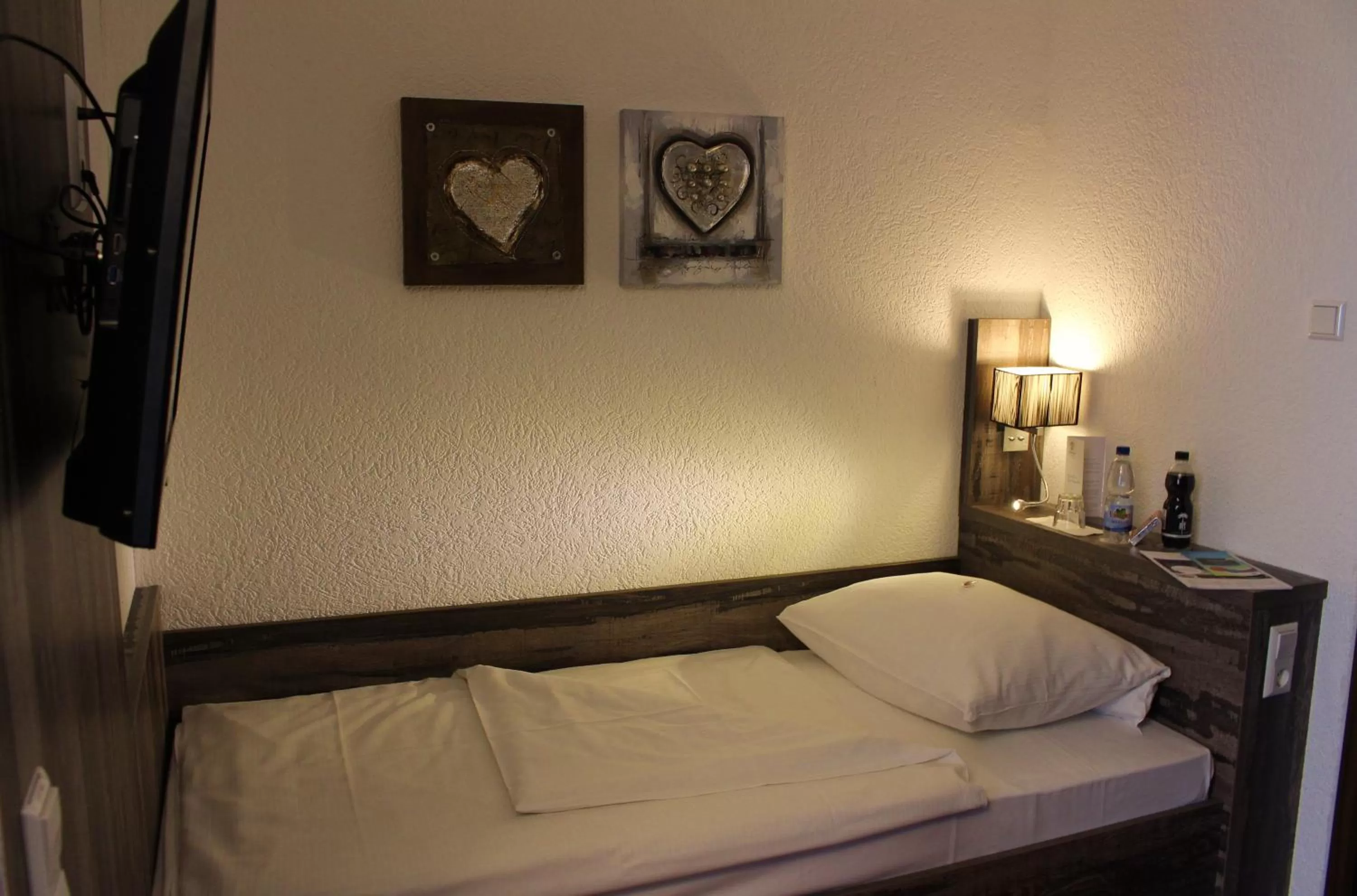 Bed in stadthotel miya