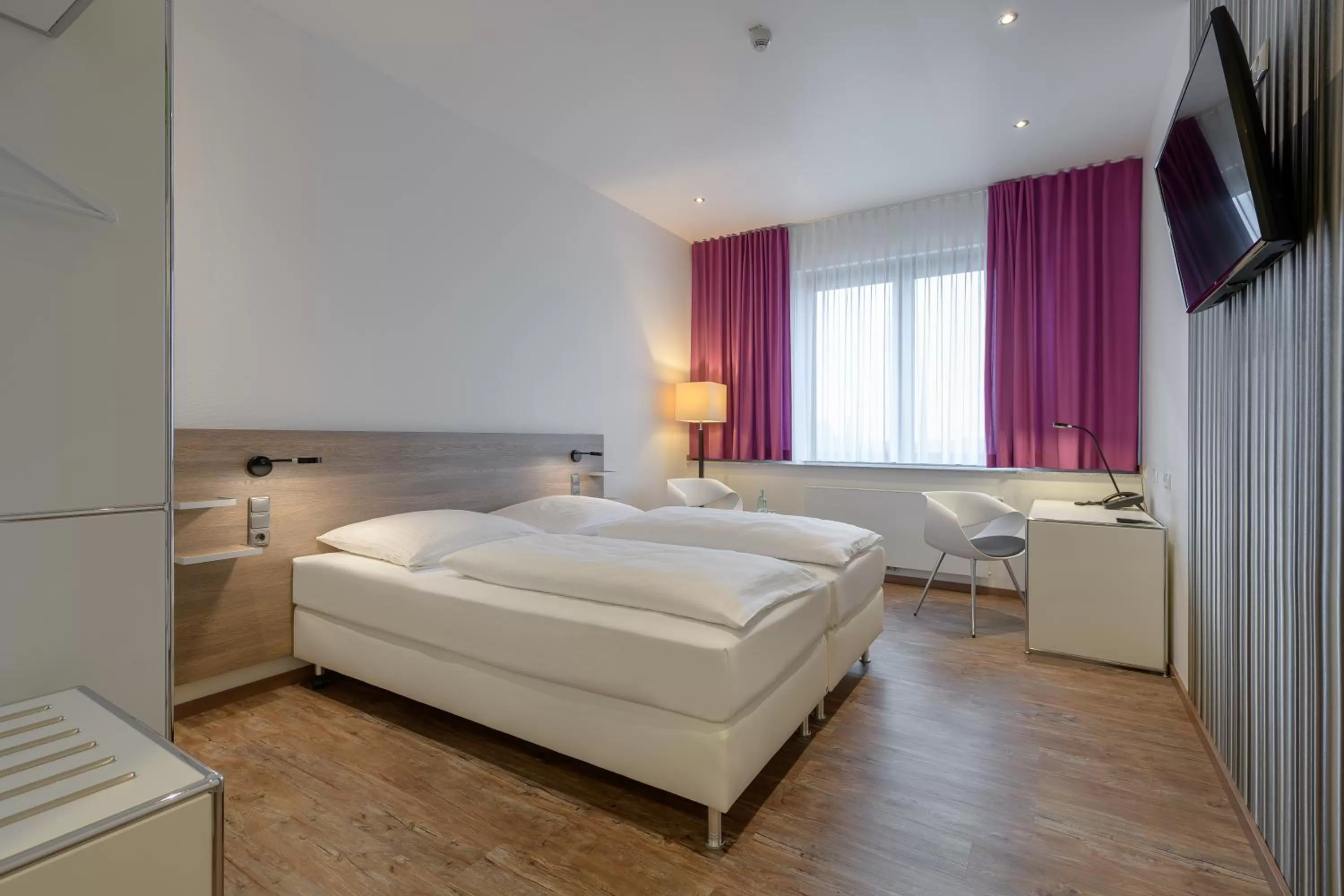 Photo of the whole room, Bed in Panorama Hotel Schweinfurt