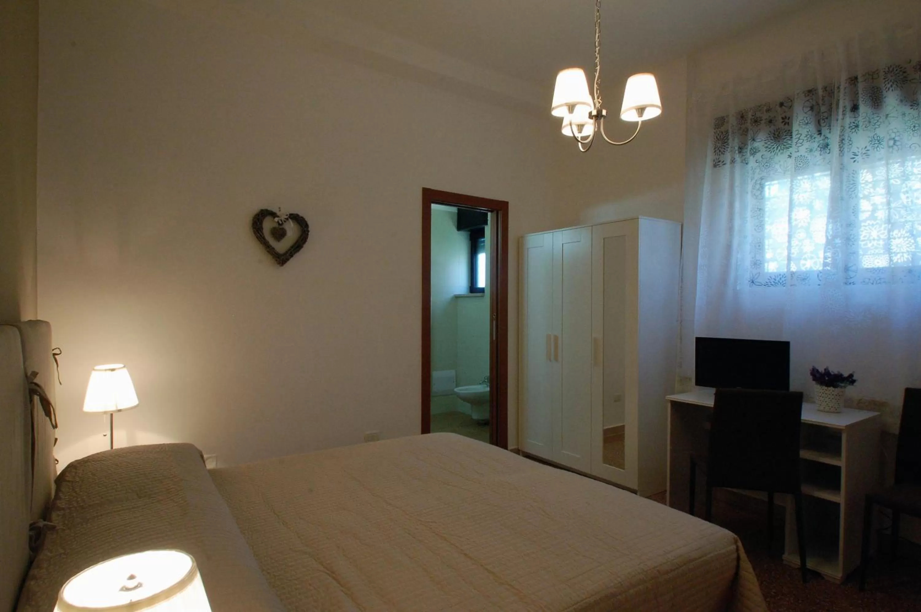 Photo of the whole room, Bed in Giardino dei Frutti