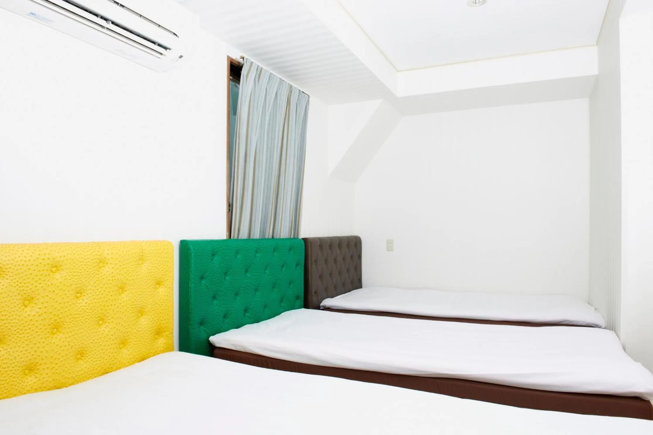 Bed in Hotel Empire in Shinjuku