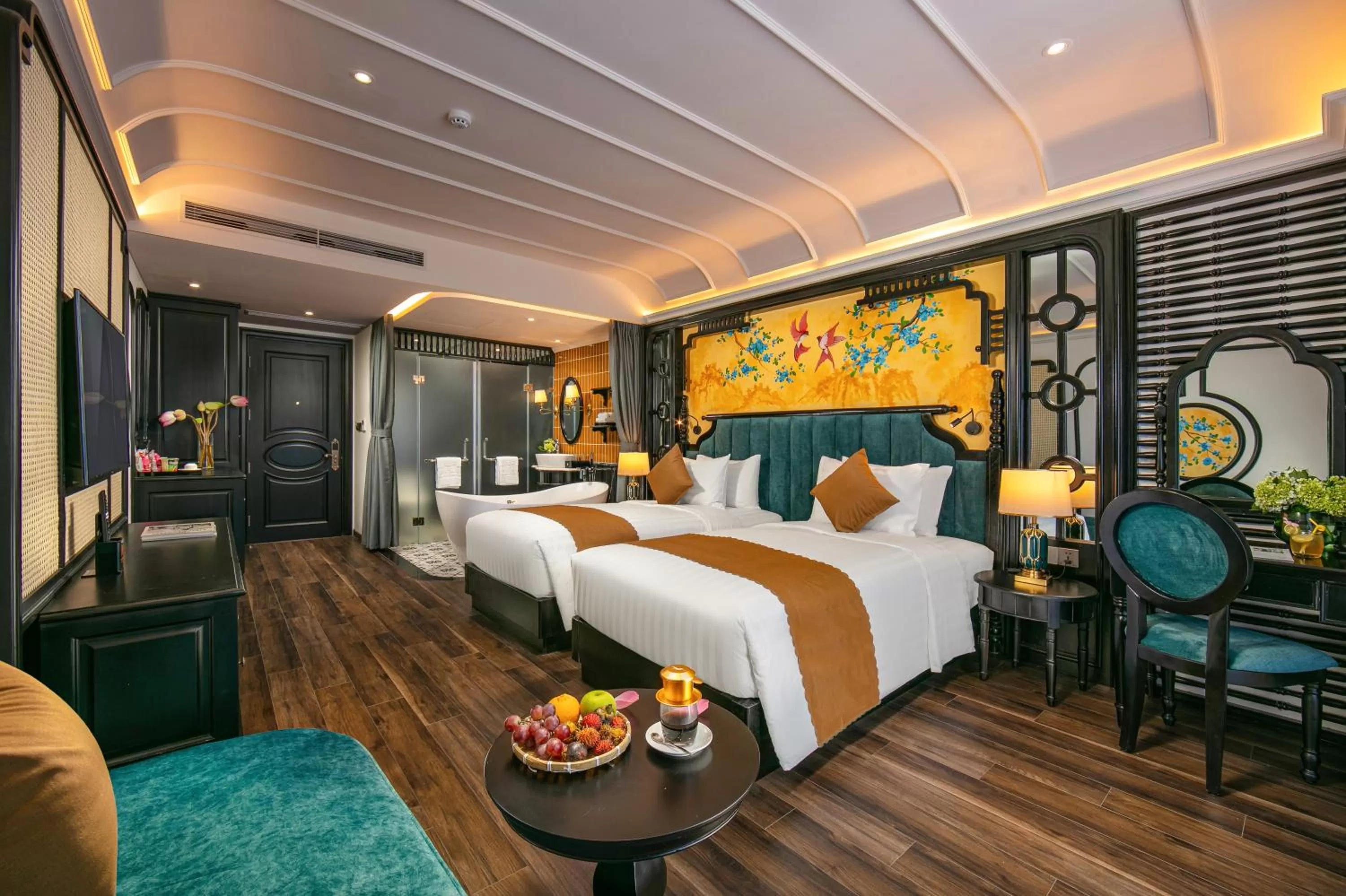 Bed in Grand Sunrise Palace Hoi An- A Luxury Indochine Hotel & Spa
