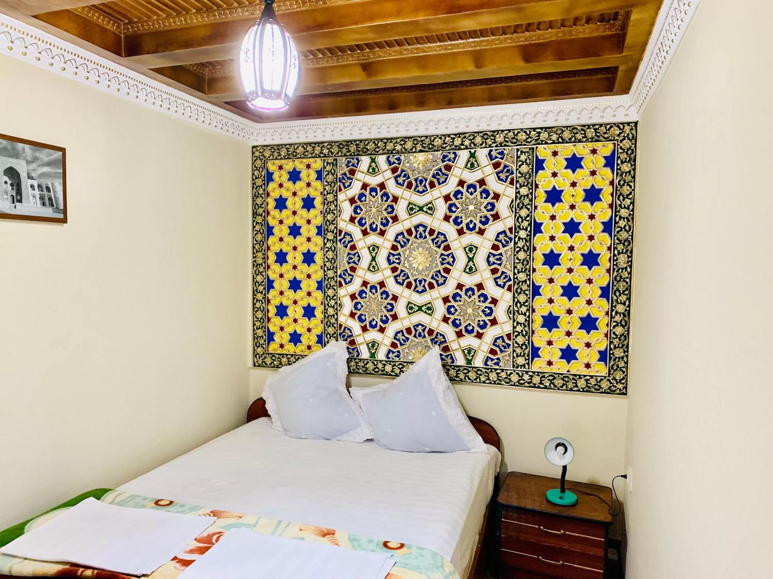 Bed in Sukhrob Barzu Hotel