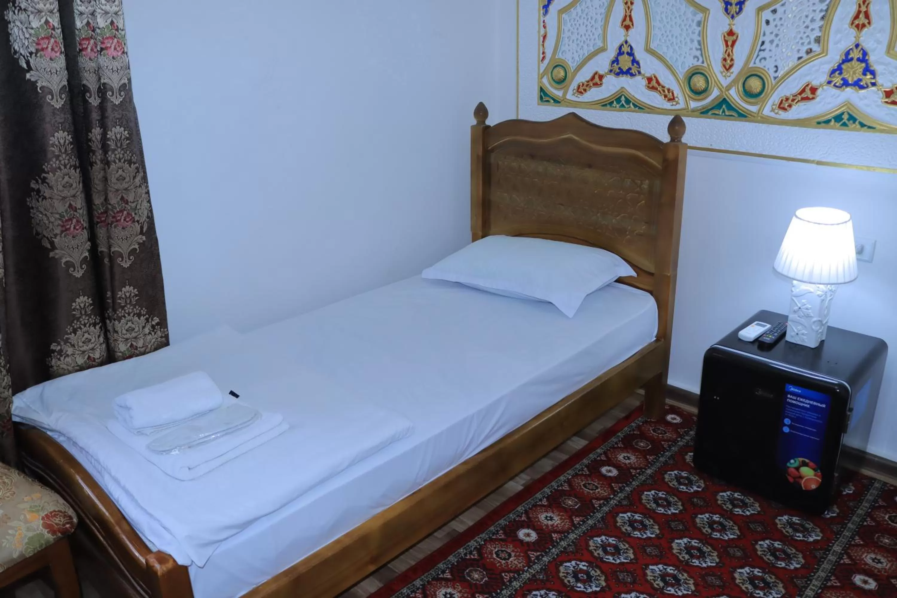 Photo of the whole room, Bed in Bukhara Baraka Boutique Hotel