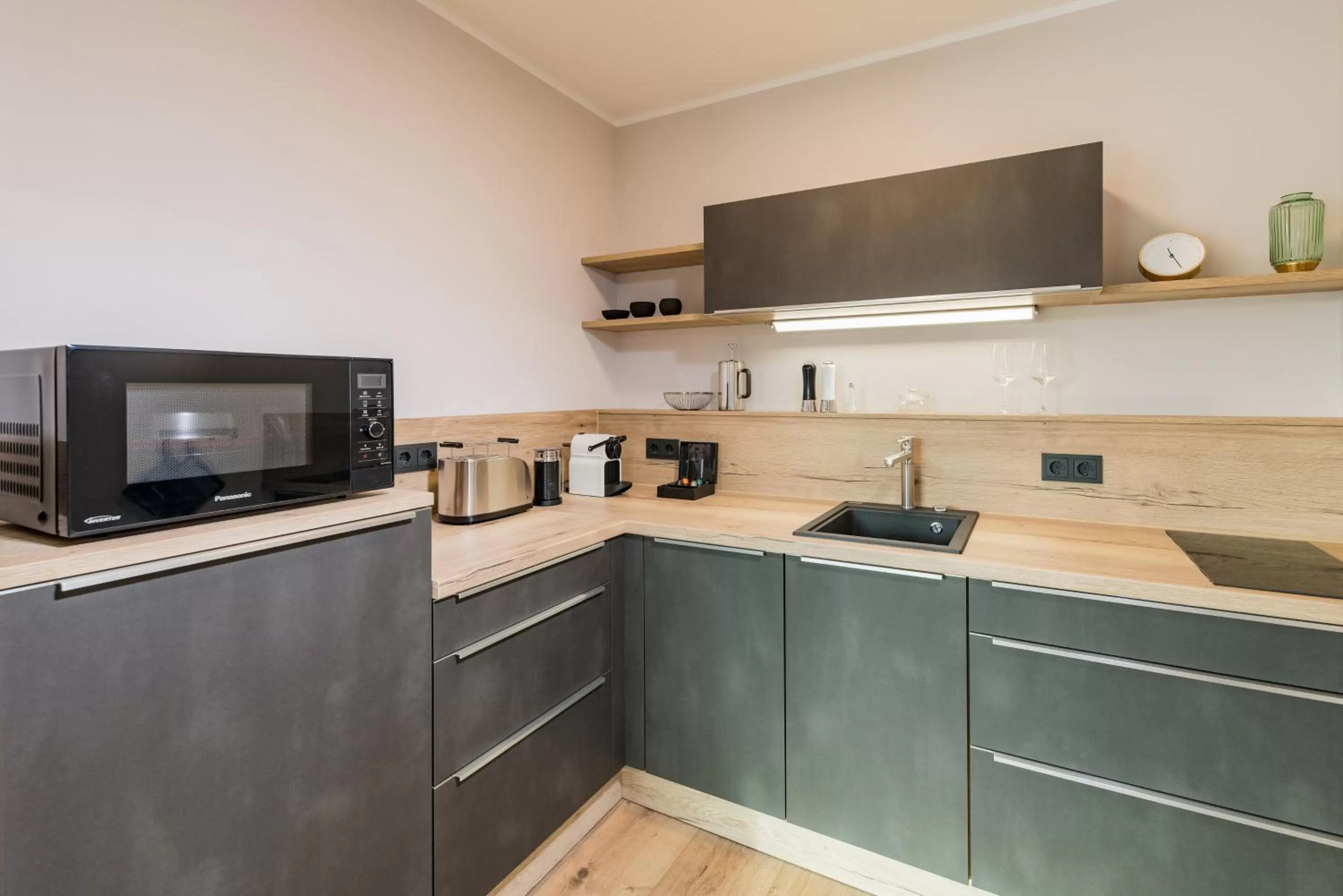 Kitchen or kitchenette in Suites MITTE - Aparthotel
