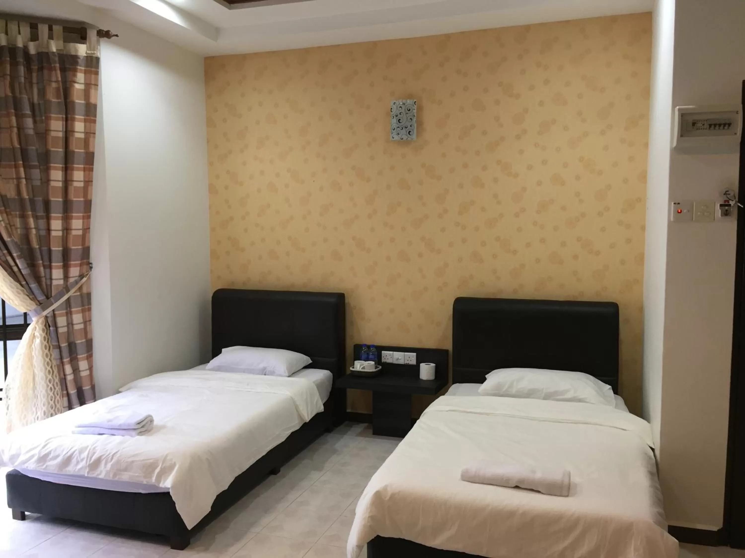 Photo of the whole room, Bed in Homestay Muar