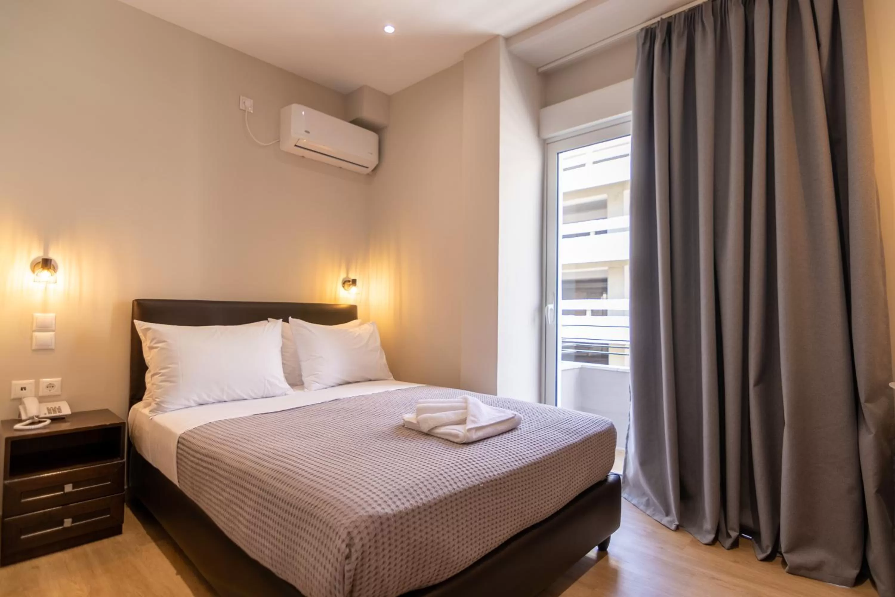 Bed in New Amaryllis Hotel